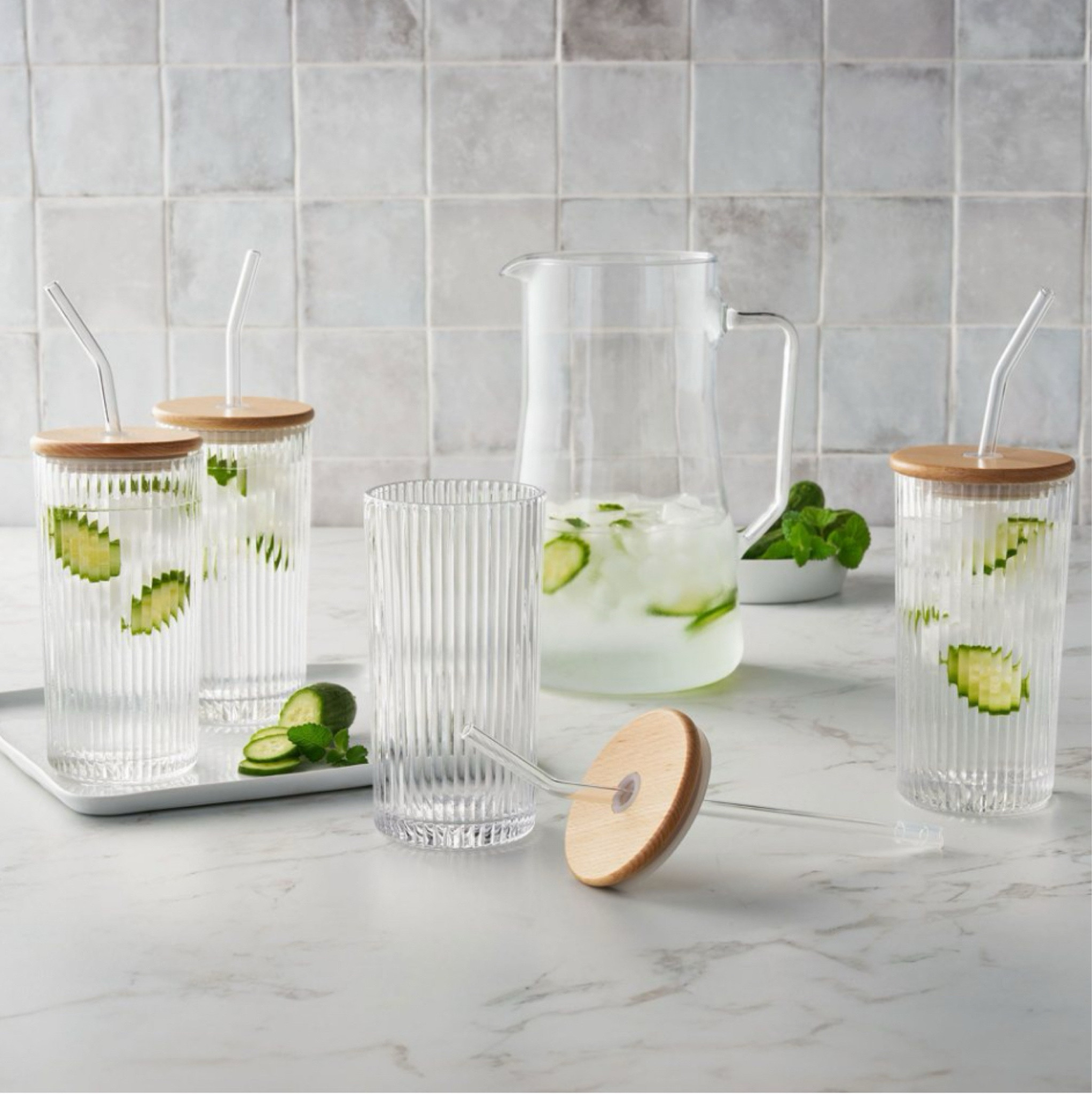 Just picked these up! They’re such good quality. Not too thin that they feel like they’ll break easily but not too heavy either. They coming a pack of 4 with straws and lids for $15!! I like them as tumblers but I love that they look so pretty as just glasses too! They come in clear, green, and pink! 

#LTKHome #LTKSeasonal
