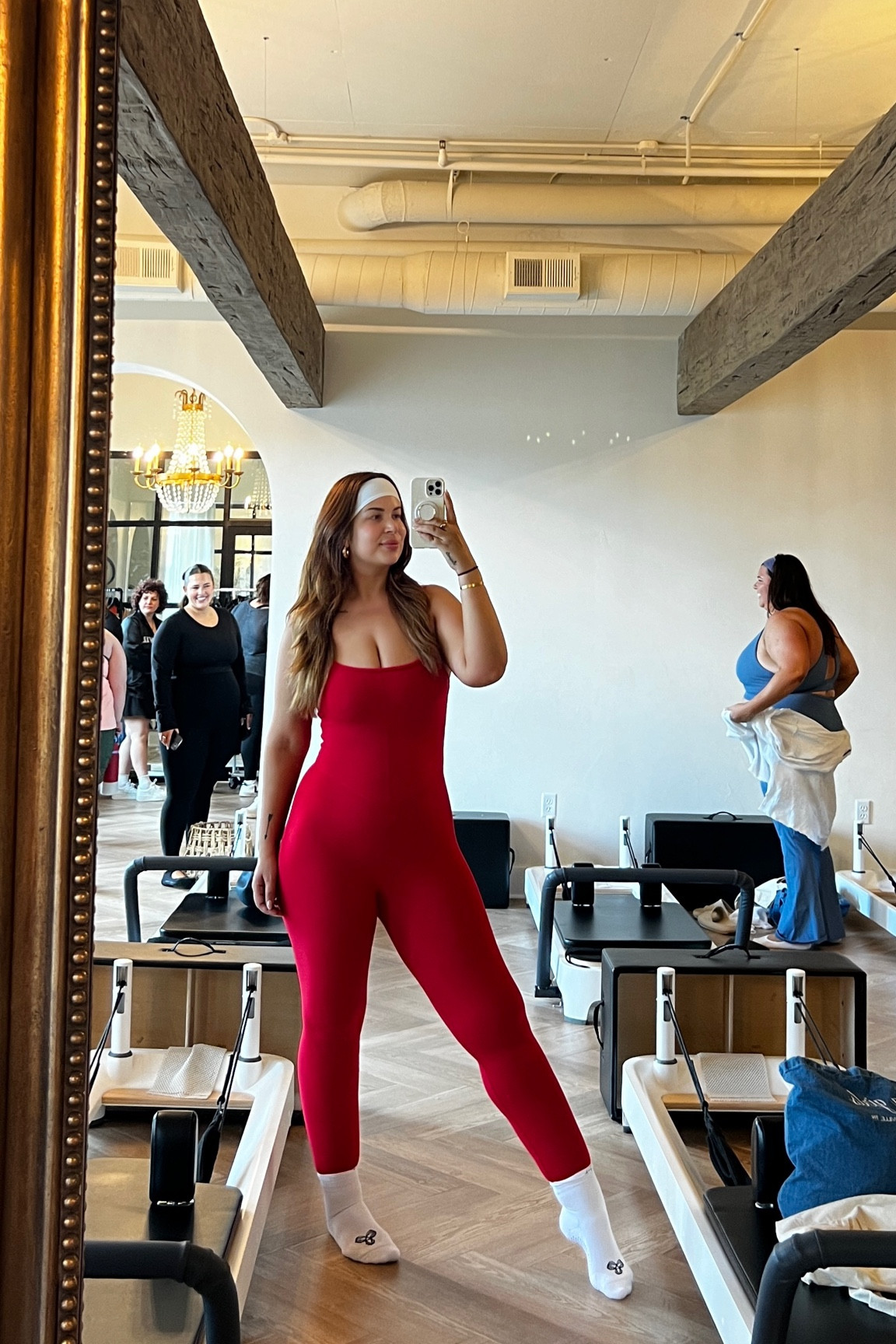 SIZE DOWN for a compressed fit with lots of stretch still! Wearing size L