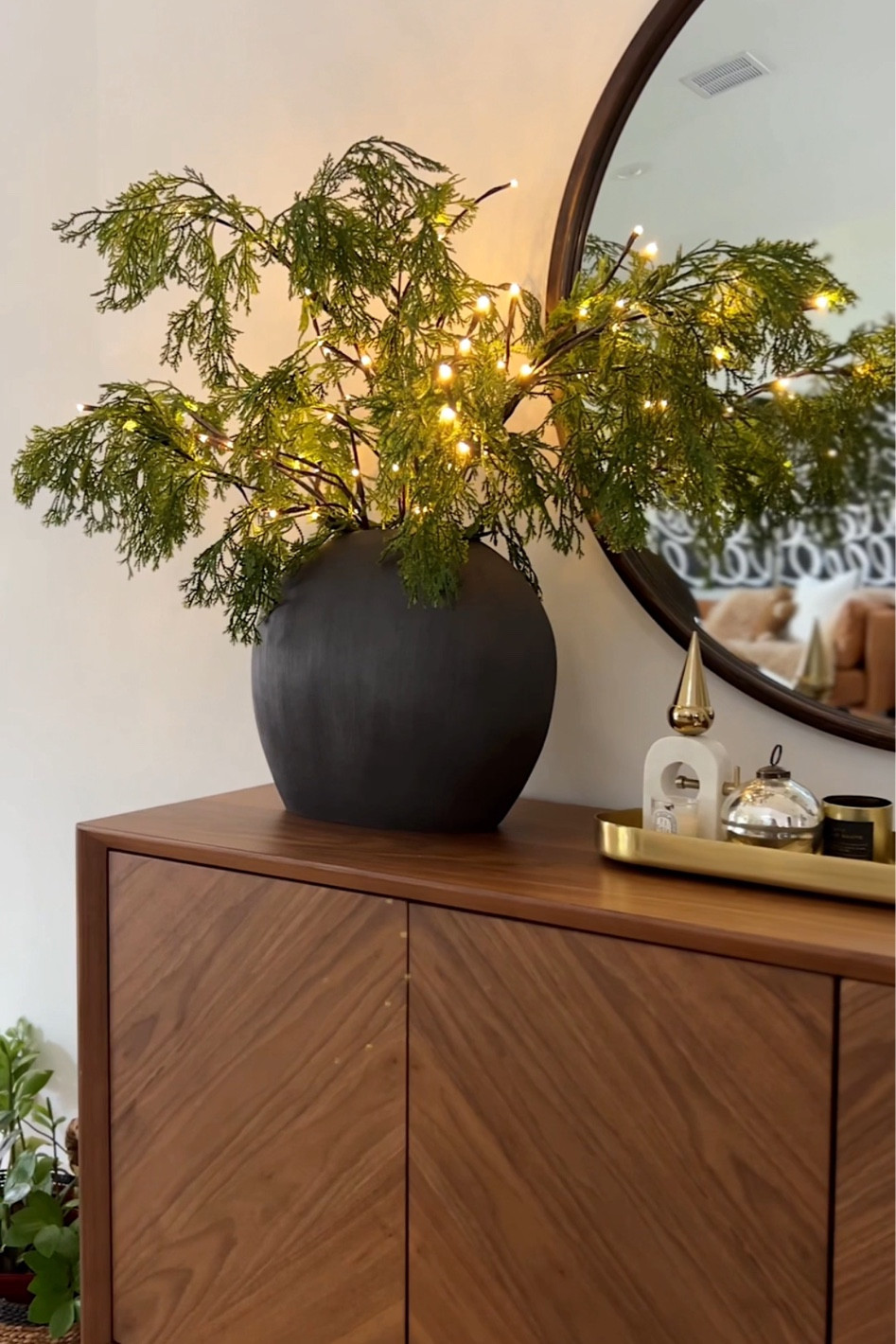 Faux lit branches! The light branches are from amazon and wrapped around the faux juniper branches. #meandmrjones #christmasdecor 

#LTKunder50 #LTKHoliday #LTKhome