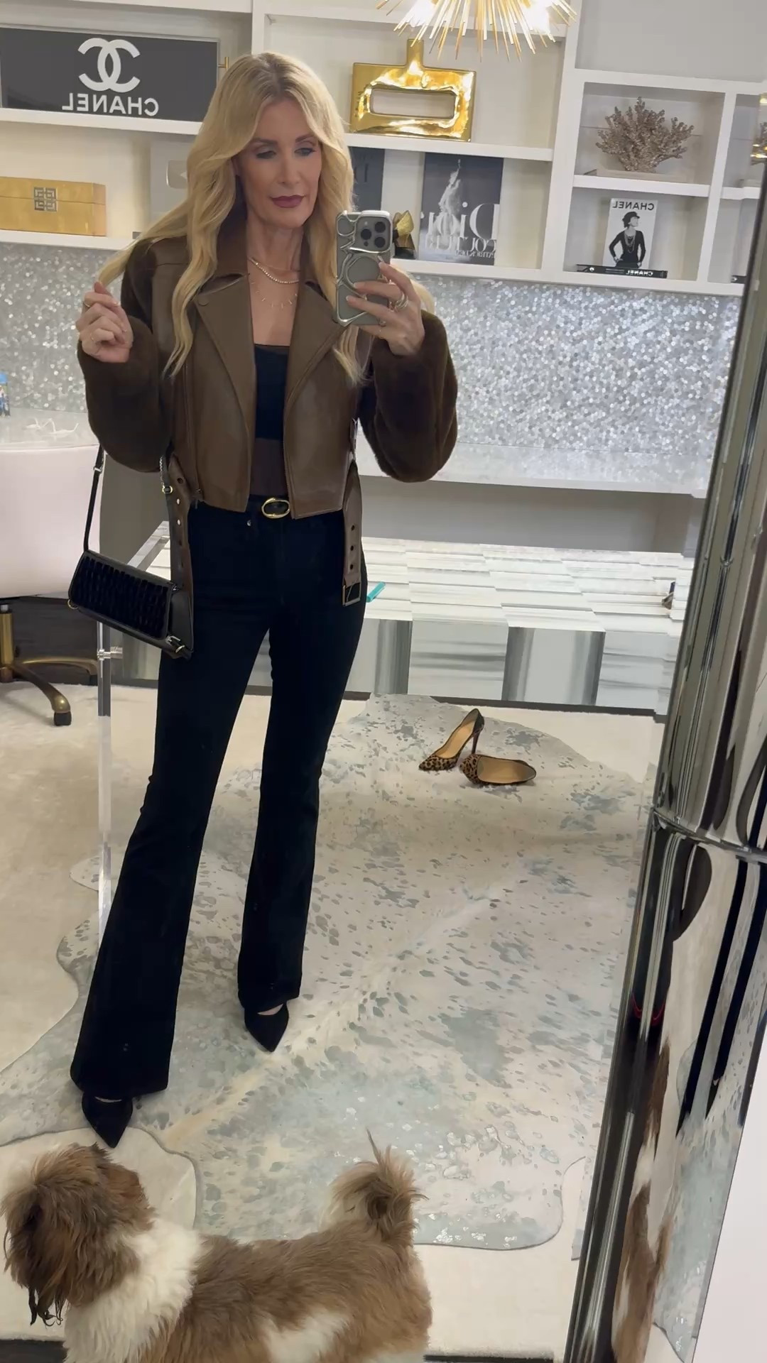 Obsessed with this jacket ✨✨✨
This cropped moto with faux fur sleeves looks straight-up designer—like premium, high-end vibes—but at a fraction of the price. The cropped fit is so flattering and instantly makes the whole outfit feel elevated and expensive.

I paired it with my ride-or-die Veronica Beard Beverly black flares—hands down some of the most slimming jeans ever. These are guaranteed to make your legs look miles long.

Both pieces run true to size. I’m wearing an XS in the jacket and a size 24 in the jeans.



#LTKootd #LTKOver40 #LTKgrwm