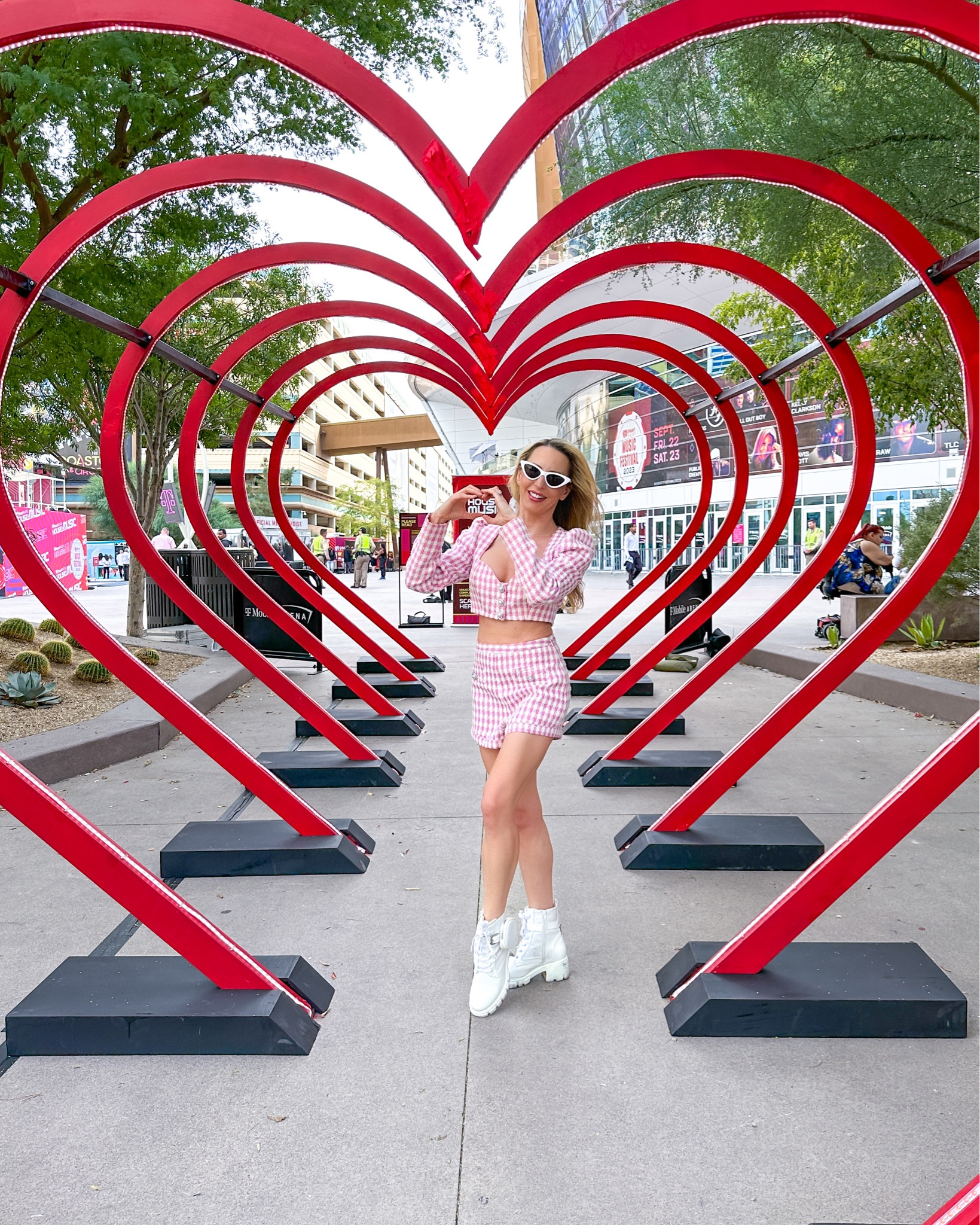 Music festival outfit inspo and comfortable white ankle boots that were comfy enough to walk and stand for 7 hours in. Pink and white check shorts and long sleeve top with pearl and crystal buttons always gets a ton of compliments and it’s on sale!

#LTKshoecrush #LTKSale #LTKsalealert