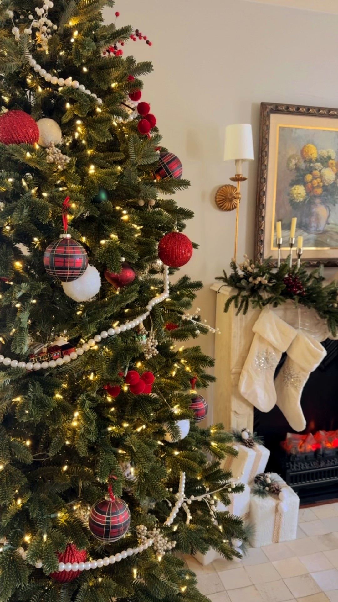 It’s time! 🎄 Whenever I look for new Christmas ornaments, I always pick one hero and build around that for the year. This year, it’s all about the plaid balls.

I wanted it to feel luxurious but traditional, so adding pearls and pops of white and bright red brings a festive touch.

I scored this awesome Balsam Hill Fraser tree at the end of last season, and it’s stunning! The lights can shift from warm white to multicolor and can be adjusted for brightness.

The coordinating garland was the perfect finishing touch.  