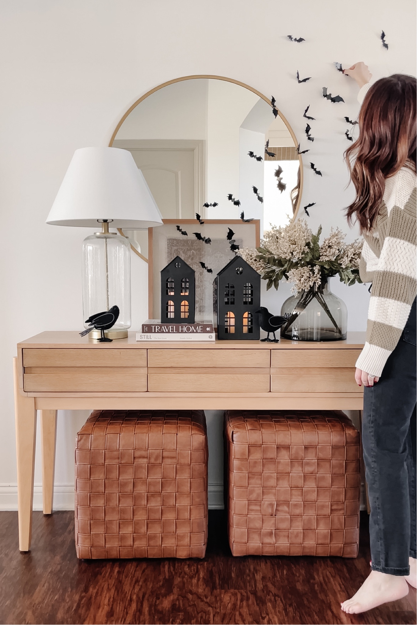 Metal haunted houses, neutral Halloween decor, target white oak wooden console table, faux leather woven cube ottomans

#LTKFind #LTKhome #LTKSeasonal