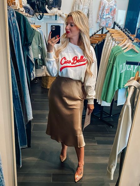 Cute easy outfit for meeting days. I love this flowy pencil A line skirt. Pairing it with a loose fitting crewneck sweater. 

#LTKfindsunder50 #LTKsalealert #LTKstyletip