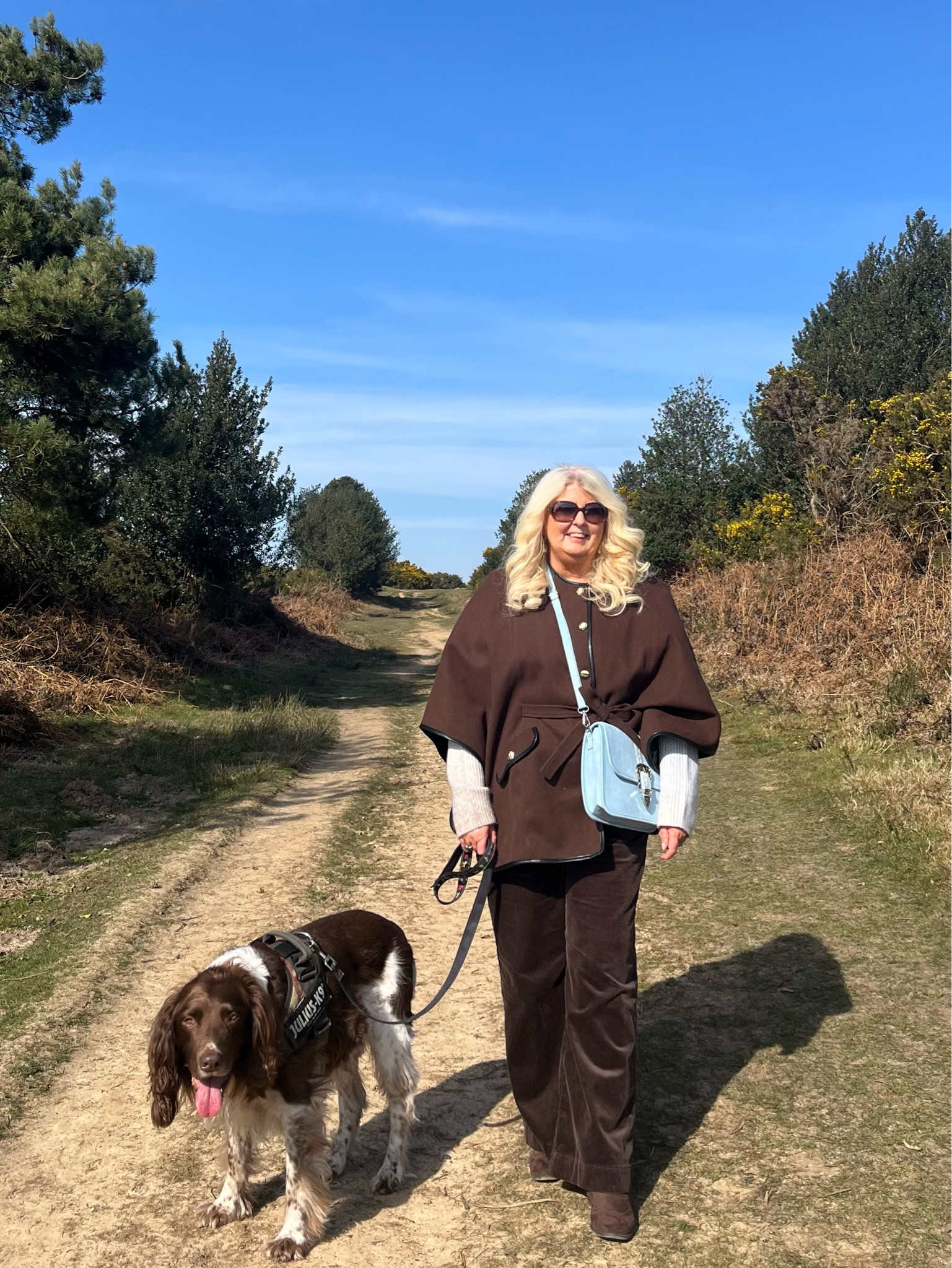 Chocolate brown cape with light blue 

#LTKfindsunder100 #LTKSeasonal #LTKeurope