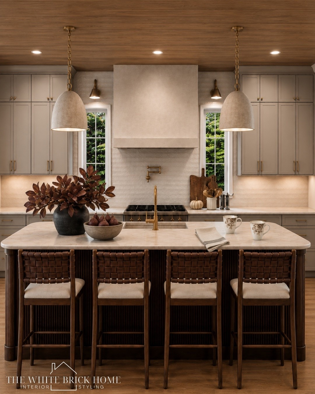 Warm wood, creamy stone, and rich layered textures makes this kitchen the perfect blend of cozy fall warmth and timeless luxury. 
🖤🖤
Kitchen, kitchen lighting, kitchen pendant light, stools, counter stools, home decor, home design, kitchen design, kitchen ideas, kitchen finds, home decor, home design, pottery barn, McGee and co