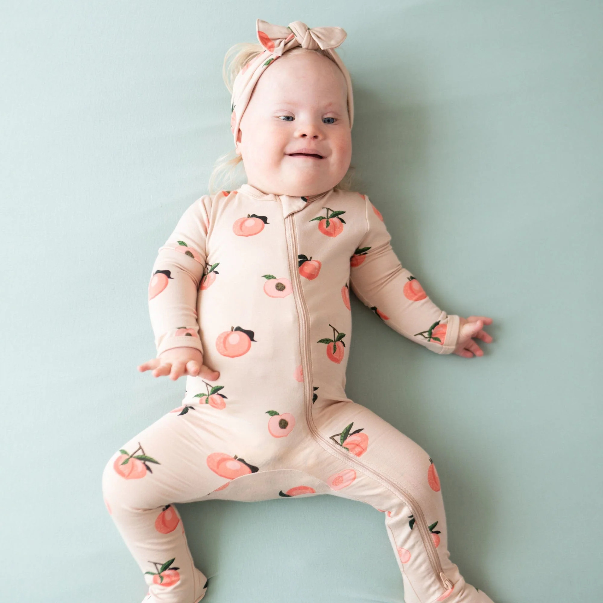 Zippered Footie in Peach | Kyte Living