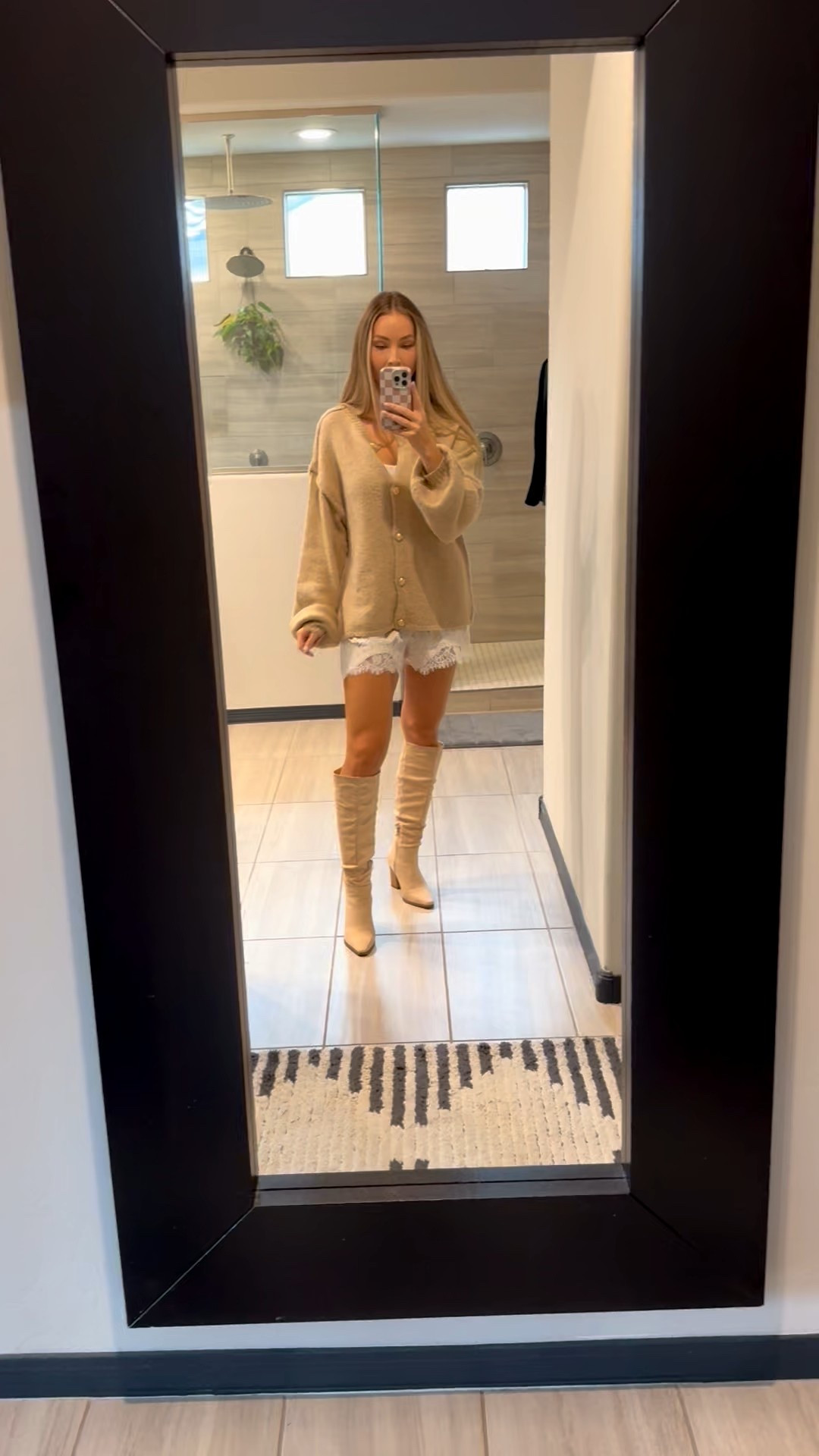 Such a cute fall/winter outfit. Beige cardigan in a large or oversized look. Champagne satin lace shorts in a small. Nude boots#LTKStyleTip

#LTKSeasonal #LTKWorkwear