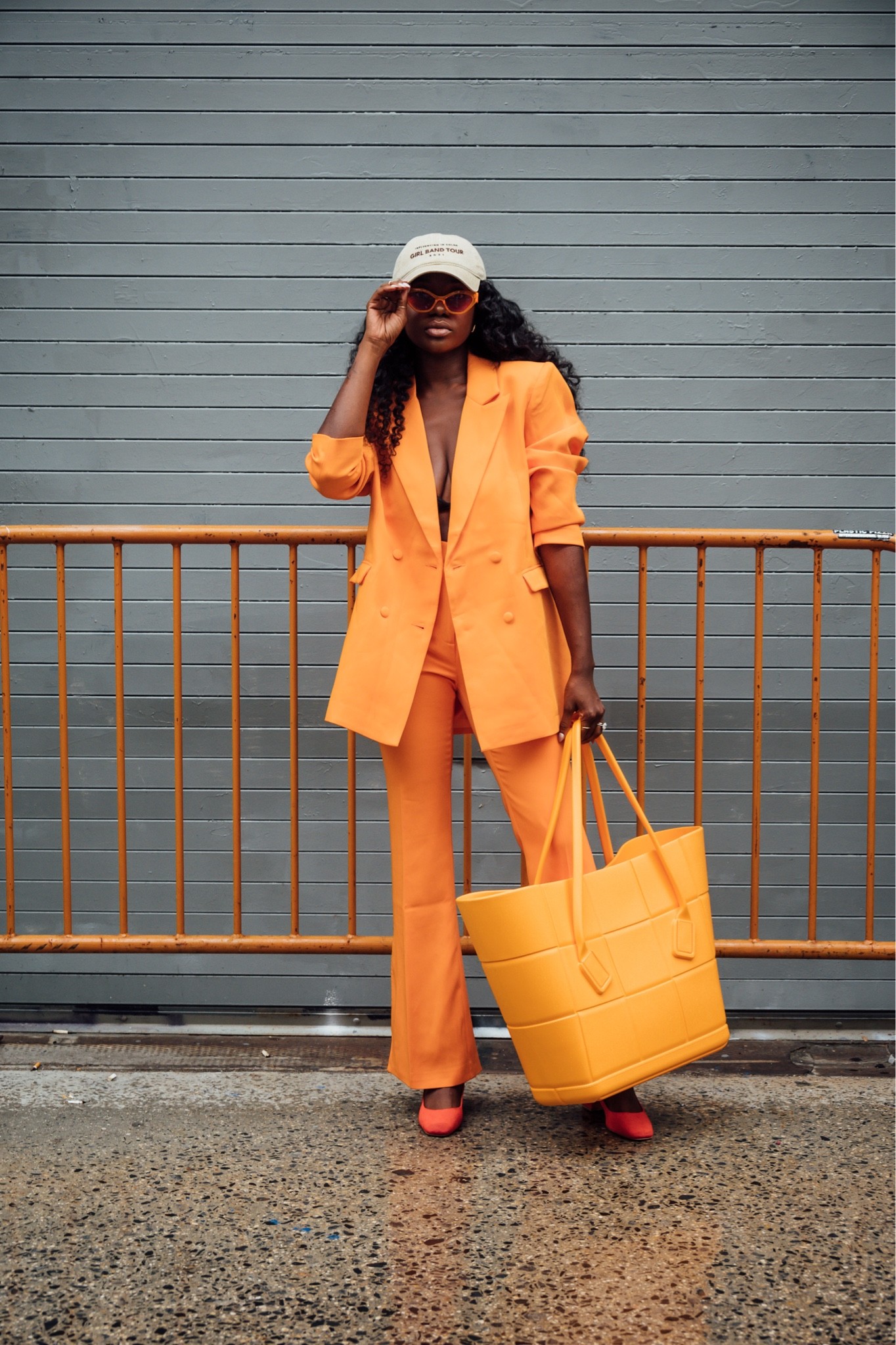 Orange suit for fall! Oversized blazer and  pants with a side split paired with my large Bottega tote bag  

#LTKunder100 #LTKsalealert #LTKSeasonal