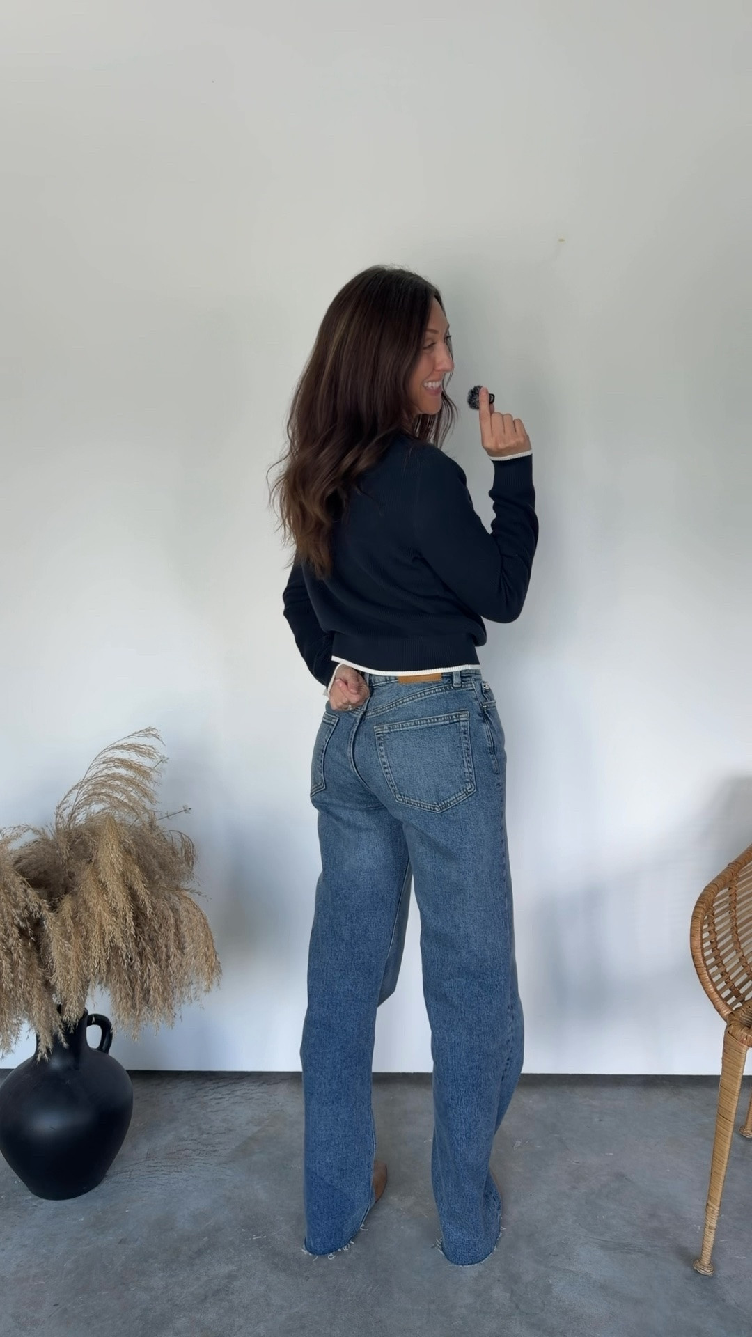 Wearing small tops and 27” long jeans