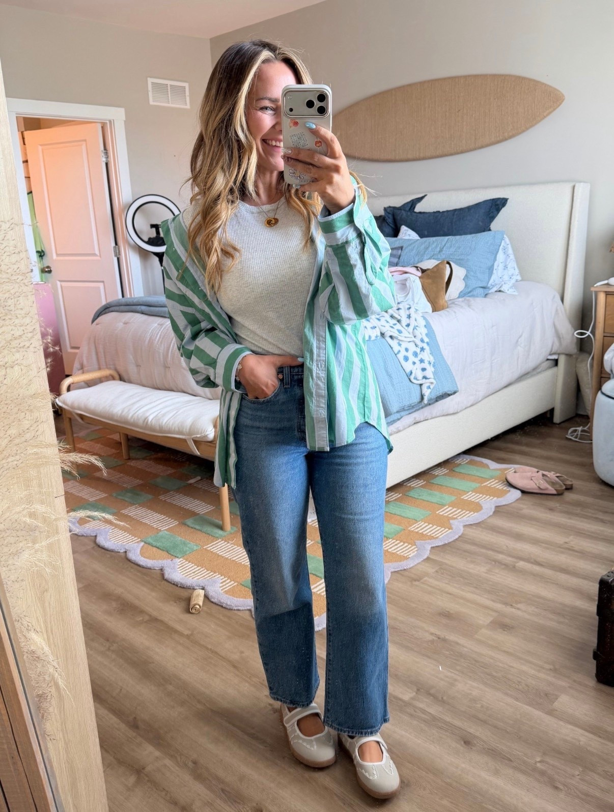 POV: you found the perfect casual spring outfit and now you’re wearing it on repeat 💚

This striped button down + basic tee + straight leg denim combo is that effortless “I didn’t try but still look cute” vibe. The green adds the prettiest pop for spring and these jeans are SO flattering (the fit is everything).

Finished it off with comfy flats you can actually walk in all day 🙌🏼

✨ True to size across the board
✨ Lightweight layers = perfect for unpredictable spring weather
✨ Jeans have the best straight leg fit (not too tight, not too wide)

Everything linked for you here 👇🏼 #LTKStyle #LTKSpring #LTKDenim