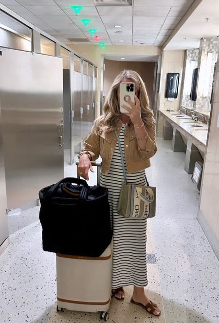 A favorite travel look

Striped t-shirt maxi dress, large black travel tote, Paravel carry-on, brown leather sandals, Chloé logo mini tote, brown 

#LTKFind #LTKstyletip #LTKtravel

#LTKStyleTip #LTKTravel #LTKOver40