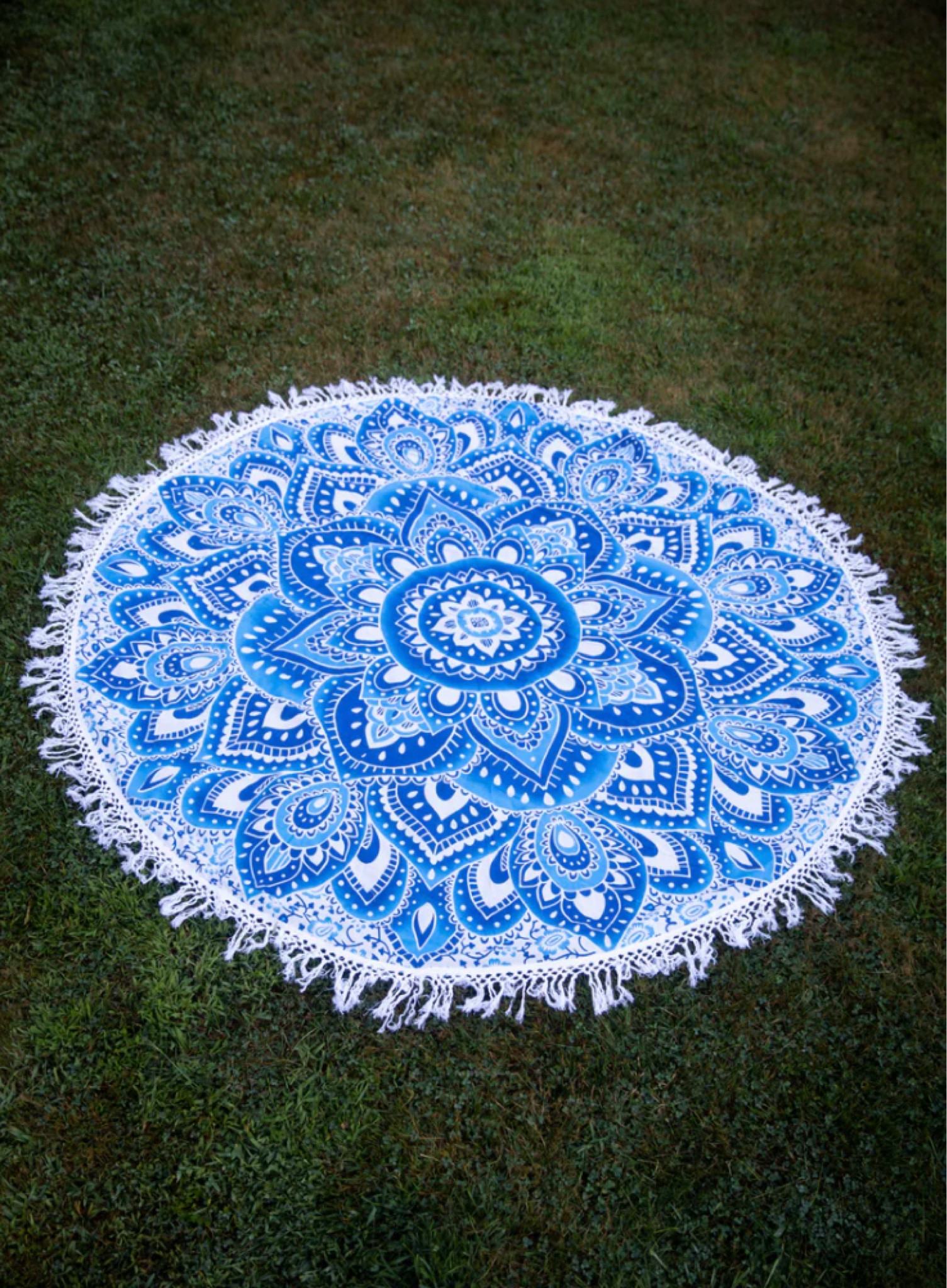 Mandala Beach Tapestry. Enhance the good vibes and zen style of your decor or beach adventures with a round mandala fringe tapestry! Mandalas represent a sacred geometry that will bring positive energy to your space, as well as brighten up your walls! This unique round wall hanging can also be used as a tasseled tablecloth, bedspread, picnic blanket, and more! 

#LTKtravel #LTKFind #LTKU