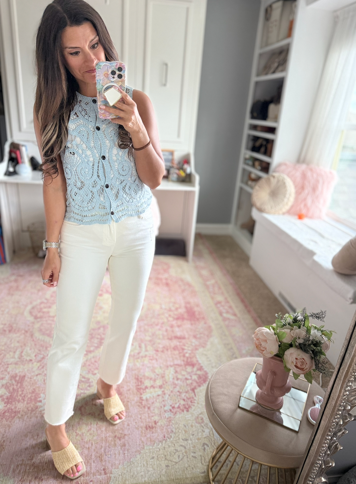 Summer look with white pants and a blue lace vest 

 