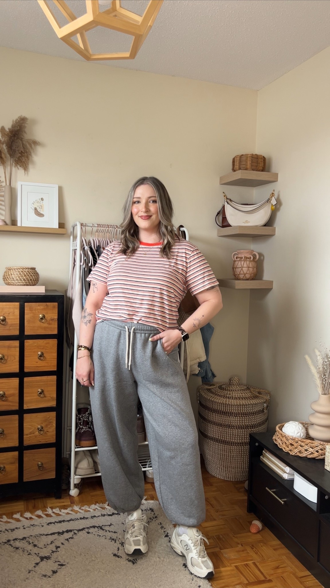 Comfies from aerie on sale! Sized up to XL in the striped tee because I have a larger chest and didn’t want it tight. Wearing my usual size L in the baggy jogger sweatpants (so soft inside!) New Balance sneakers are super comfy but run a little big, I’m a 9.5-10 and wear a 9

#LTKmidsize #LTKsale