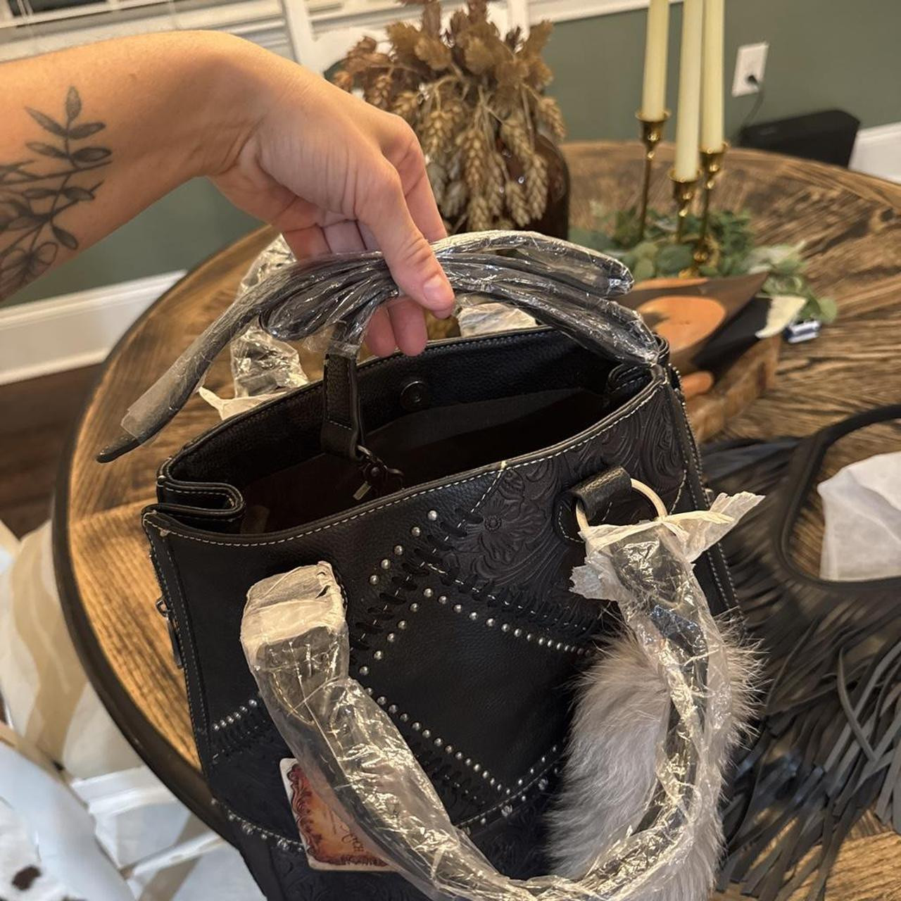 Trinity ranch Black leather handbag with fur... | Depop US