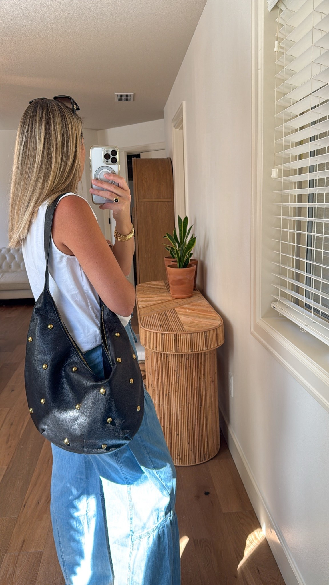 Best curve leather shoulder bag that you need in your wardrobe 🖤

Worth the splurge! 

#LTKOver40 #LTKxMadewell #LTKItBag