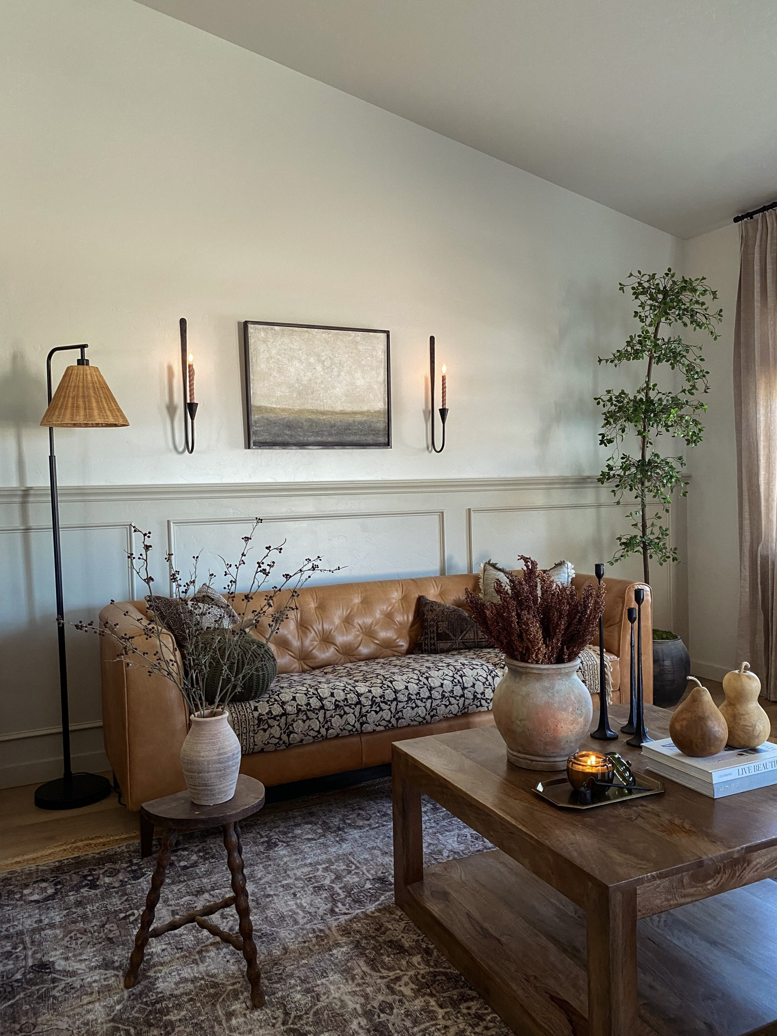 Living room inspo, fall decor, custom curtains, pinch pleat curtains, floor to ceiling curtains, neutral sofa, beige sofa, west elm penn chair, green accent chair, vintage pillows, Turkish pillows, boucle pillow, shady lady tree, faux tree, greenery, Walmart floor lamp, rattan floor lamp, round coffee table, wall sconce, tapered candle holder, leather sofa, shady lady tree, loloi Sinclair rug, throw pillows, floor length mirror, arch mirror, Target home decor, affordable home, black cabinet, studio McGee cabinet, round glass coffee table, target accent table, Sinclair loloi rug, vintage inspired rug, vintage milking stool, foot stool


#LTKstyletip #LTKhome #LTKxPrime