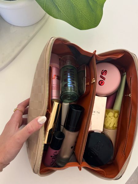 I’ve repurchased this makeup bag twice! It is my favorite for travel! Holds a ton of products, has two sections and a small zip middle compartment. Comes in a ton of colors!

Amazon find | makeup | checkered makeup bag 

#LTKbeauty