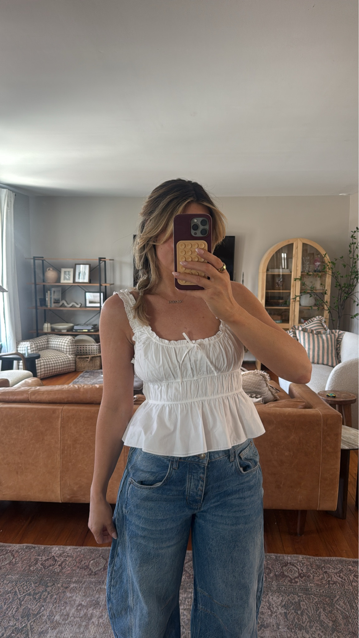 Top size medium 
Jeans size 28 ( typically an 8)
Sneakers tts