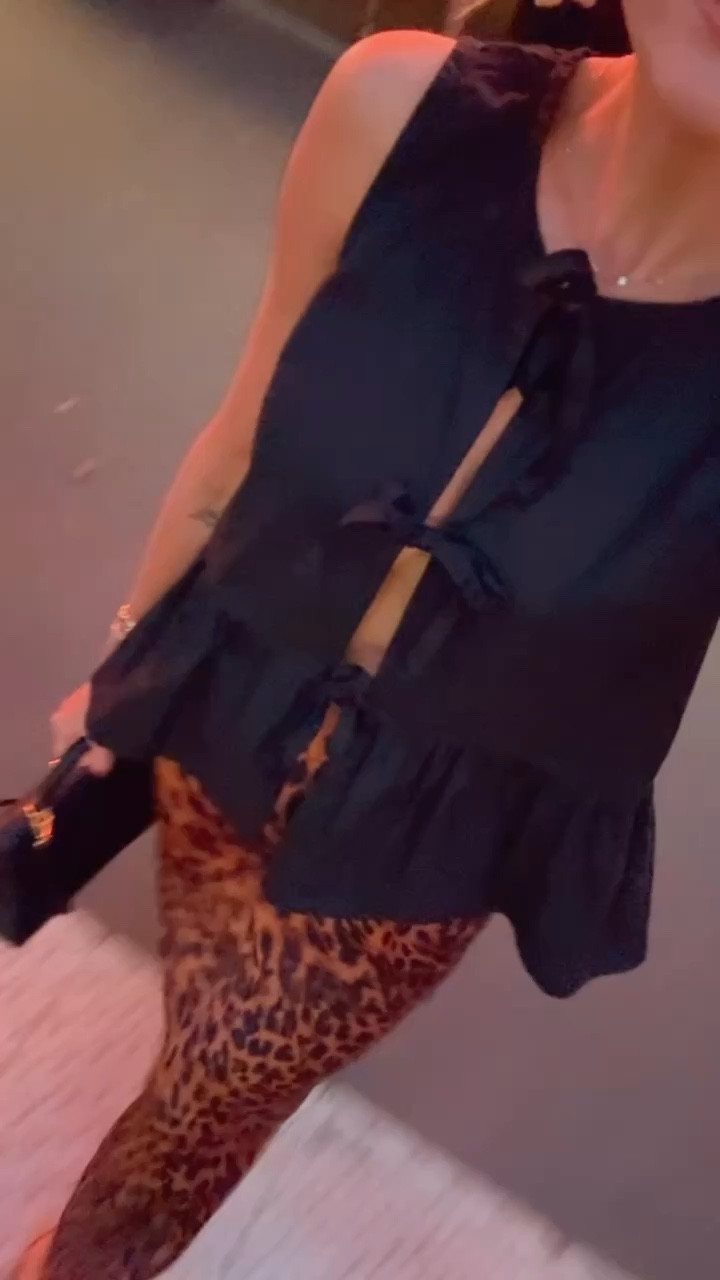 This top paired with this skirt is so fun! Wearing S in top & XS in skirt! 

Loverly Grey, Paris outfits, leopard print, midi skirt, tie top, date night looks, dinner outfits, girls night out 

#LTKSeasonal #LTKStyleTip