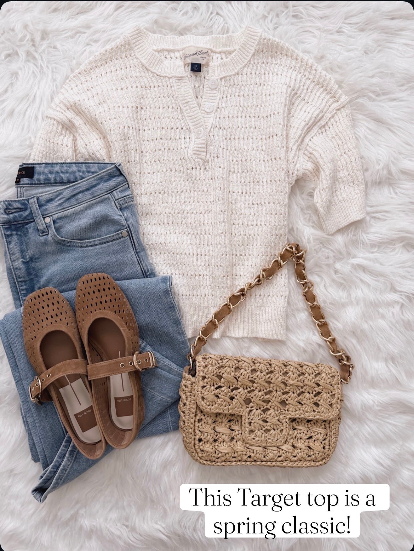 This top is one of those pieces that makes every spring outfit look better.

spring top, open stitch top, target fashion find, casual outfit ideas, jeans outfit, neutral outfit, mary jane flats, woven bag, affordable fashion, everyday style, spring basics, womens tops

#LTKMothersDay #LTKSeasonal #LTKOver40