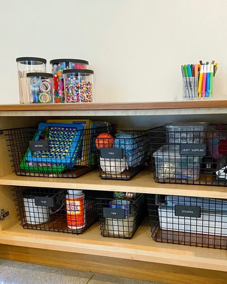 A colorful space to inspire creativity! Clear canisters and grid baskets make it easy to find craft supplies in this art room

#LTKfamily #LTKkids