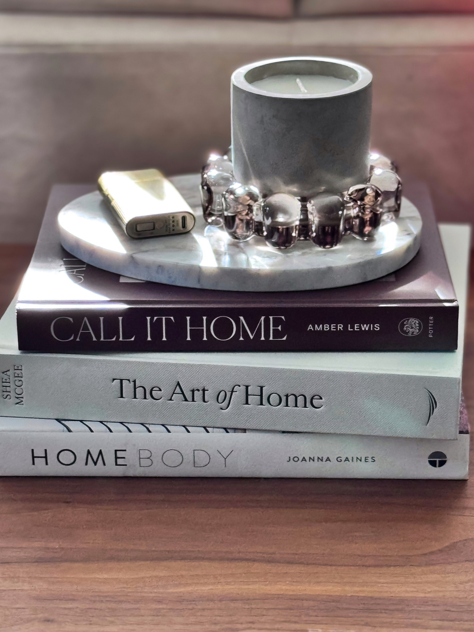 Soft, neutral, and effortlessly chic—this little Easter corner is giving calm, collected, and curated. I styled this bubble candle dish on our sideboard with some of my favorite design books to create the prettiest layered moment. The modern candle and metallic bubble detail add just the right amount of texture and shine while still keeping that clean, minimalist vibe I love for spring.

Even though the marble egg tray isn’t linkable, it’s such a simple piece to recreate this look with anything similar you already have—think a small stone tray or dish to anchor the whole setup. It’s the perfect way to decorate for Easter without going overly themed—just fresh, elevated, and timeless.

neutral home decor • easter home decor ideas • spring sideboard styling • modern farmhouse decor • marble tray styling • coffee table books decor • minimalist home styling • neutral easter decor • home decor inspiration • shelf styling ideas • aesthetic home decor • cozy modern home • decorative tray ideas • subtle seasonal decor • Coffee Table Books

#LTKspring #easterdecor #springdecor #neutralhome #modernfarmhouse #homestyling #cozyhome #minimalhome #shelfstyling #coffeetabledecor #interiorinspo #homesofinstagram #simpledecor #easterinspo #decorideas #styledhome #homedetails #currenthomeview #neutraldecor

#LTKSeasonal #LTKHome #LTKvlog