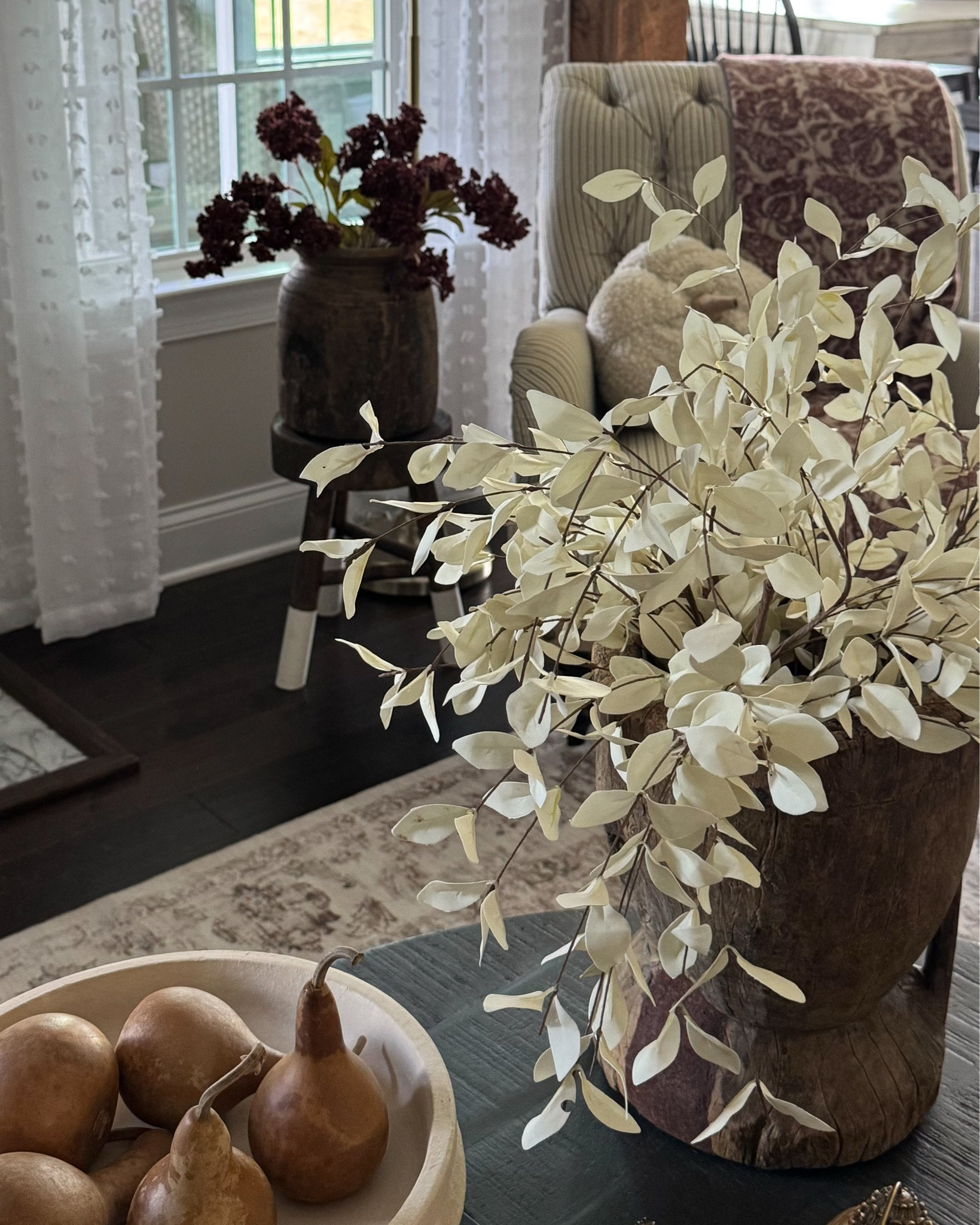 My home was absolutely made for Fall!! The rich tones and colors always look the best🤎🍂

Console table, ottomans, floral throw blanket, taupe vase, toasted eucalyptus, white eucalyptus, vintage wood mortar, vintage bowl, plum stems, moody hydrangeas, round coffee table, woven storage boxes, pedestal bowl, dried gourds, floor lamp with woven shade, chandelier, brass salt & pepper mills, burgundy magnolia wreath, round marble board, island pendants, vintage wood vase, burgundy mini hydrangeas, vintage board, boucle cream pumpkin pillow, 100 oz candle

#LTKstorytime #LTKSeasonal #LTKHome