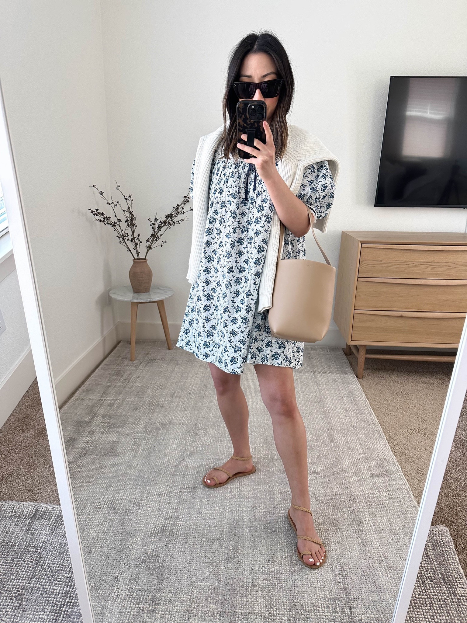 Simple summer outfits. Doen floral dresses. This is my favorite style from the brand. Fits petites well. Wearing the xxs 

Doen dress xxs
J.Crew fisherman sweater xs
Ancient Greek sandals 35
The Row park tote small
Celine sunglasses  

Dress, summer dress, petite dress, sandals, vacation outfit. 

#LTKshoecrush #LTKitbag #LTKSeasonal