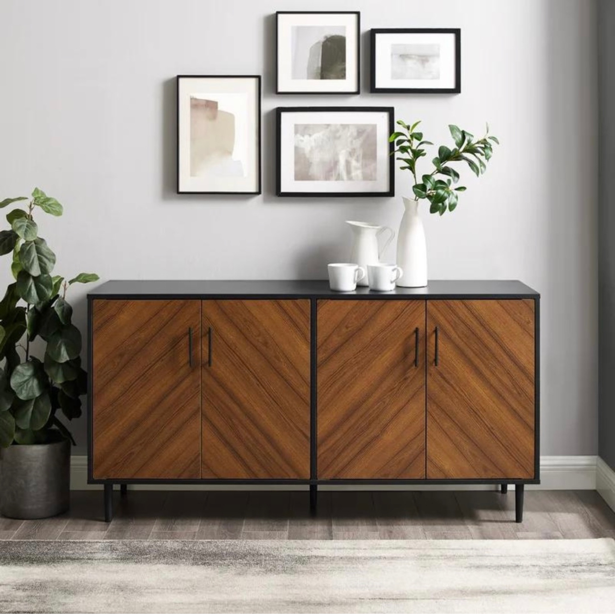 Mis-century black and wood sideboard cabinet.

home decor // living room furniture // console table // living room inspo // living room design //media console // media cabinet

#LTKFind #LTKhome #LTKsalealert