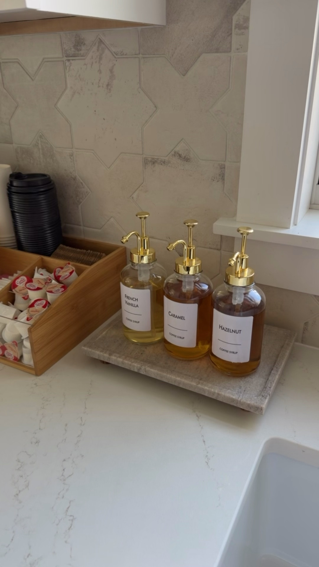 I found this glass (set of 4) coffee syrup dispenser set on Amazon to help create our little coffee bar at our Airbnb - they are so pretty for display! 

#Amazonkitchen