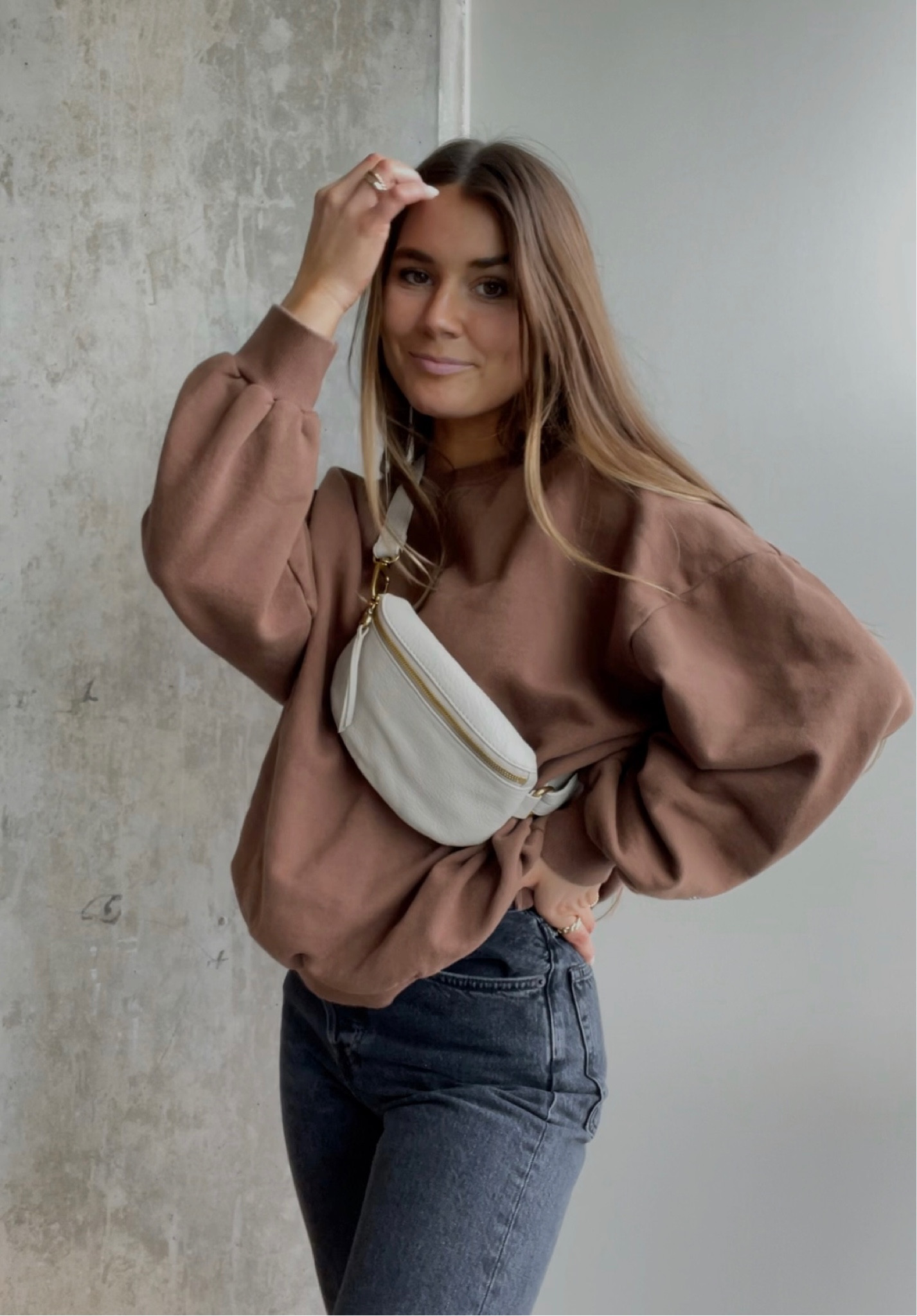 casual fall ootd
- storets brown sweatshirt
- HOBO bags belt bag
- everlane 90’s denim

#fallootd #fallstyle #ltkstyle 
fall outfit, crossbody bag, HOBO bags, storets style, everlane denim 