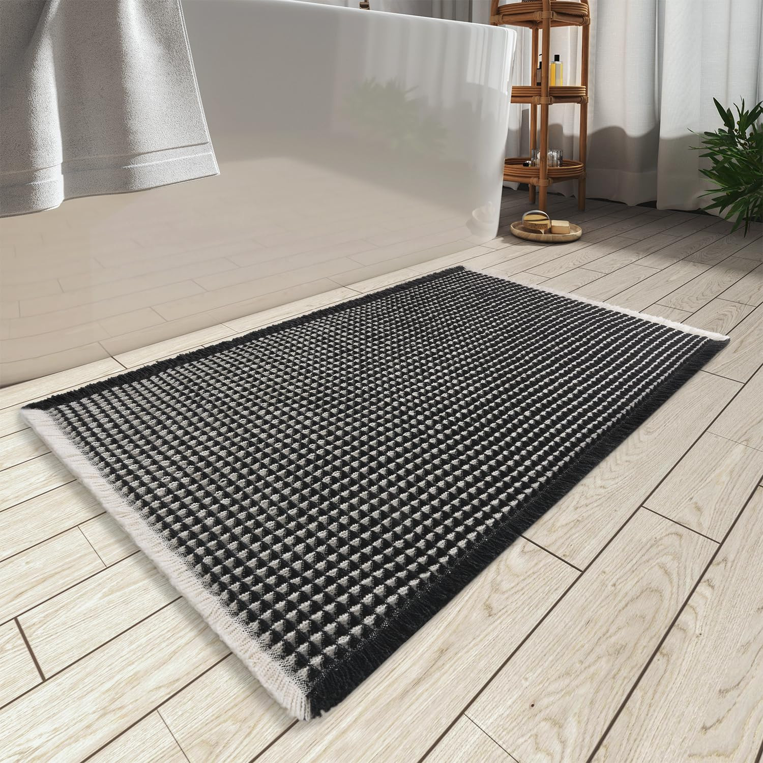  
Visit the Store, AMOAMI
AMOAMI
Visit the Store
4.0
4.0 out of 5 stars
(3,069)
AMOAMI Upgraded Waffle Bath Mat, Super Absorbent Non Slip Bath Mats for Bathroom Floor, Machine Washable Bathroom Rugs with Tassels, Rubber Backed Bathroom Mats, Ultra Soft, 24" x 36",Black & Cream
100+ bought in past month
 
 
 
 
 
 
 
 
Color: Black & Cream
 

Black & Cream
 

Black
 

Blue
 

Brown
 

Brown & Cream
 

Burgundy
 

Chocolate
 

Coral
 

Dark Green
 

Dark Grey
 

Dark Grey & Yellow
 

Darkgrey & Cream
 

Dirty Orange
 

Green
 

Green & Cream
 

Light Grey
 

Lightgrey & Cream
 

Orange
 

Sage
 

Teal
 

White
Size: 24" x 36"
 
2' x 4'
$37.39 with 15 percent savings$37.39
$43.99$43.99
In Stock
 
2' x 5'
$41.64 with 15 percent savings$41.64
$48.99$48.99
In Stock
 
2' x 6'
$48.44 with 15 percent savings$48.44
$56.99$56.99
In Stock
 
17" x 24"
$16.99 with 15 percent savings$16.99
$19.99$19.99
Only 14 left in stock - order soon.
 
17" x 48"
$33.99 with 15 percent savings$33.99
$39.99$39.99
In Stock
 
17" x 60"
$38.24 with 15 percent savings$38.24
$44.99$44.99
In Stock
 
17" x 72"
$46.74 with 15 percent savings$46.74
$54.99$54.99
In Stock
 
18" x 30"
$18.69 with 15 percent savings$18.69
$21.99$21.99
In Stock
 
20" x 32"
$22.94 with 15 percent savings$22.94
$26.99$26.99
In Stock
 
24" x 36"
$25.49 with 15 percent savings$25.49
$29.99$29.99
In Stock
See 3 not featured or unavailable options
Limited time deal
$25.49 with 15 percent savings -15% $25.49
Typical price: $29.99 Typical price: $29.99$29.99  
FREE Returns
Sign in to redeem. Up to 10% off  with code EOCZJEKM if you qualify Shop items
FREE delivery Tuesday, June 17 on orders shipped by Amazon over $35
Or Prime members get FREE delivery Saturday, June 14. Order within 13 hrs 8 mins. Join Prime
Arrives 1 day before Father's Day
Delivering to Rock Hill 29732 - Update location
In Stock
Quantity:
Quantity:1
 
Add to Cart

Buy Now
Ships from
Amazon
Sold by
7-MAT
Returns
30-day refund/replacement
Payment
Secure transaction
 Send as a gift. Include custom message
Add to List
Similar item with fast deliverySimilar item with fast delivery
Amazon's
Choice
 
Lahome Boho Bathroom Rugs, Small 2x3 Front Door Mat Lightwei...
4.6 out of 5 stars (986)
$23.99
 | Amazon (US)