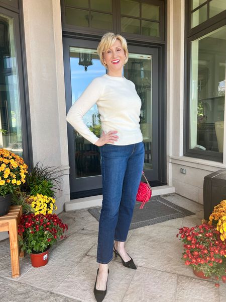 Love these chic @ mitt and bow jean in the vintage medium blue wash. These jeans are quality and fit like a glove! The light cashmere sweater is one of my favorites. So soft and cozy and an elegant quiet luxury look with jeans. Sexy sling backs and this cute red bag polish off the look! #LTKover40 #LTKjeans

#LTKHoliday