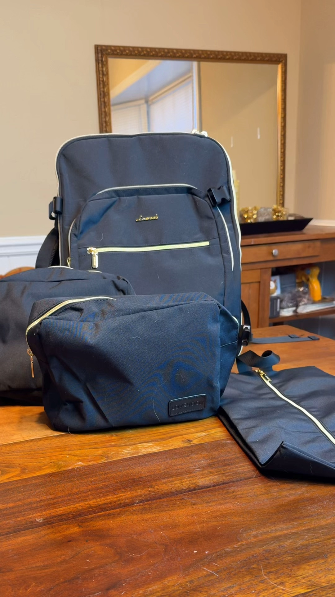 The Lovevook Travel Backpack is the perfect travel bag! They have made packing for me and my teen daughters more organized and easier to fit in the car.
  
You can pack up to 5 days of clothing so it’s great for a quick getaway. It will also fit under most airline seats and can be carried on as your personal item. The packing cubes and all of the pockets help keep your stuff organized and easy to access, while the back pouch adds a little extra security to your important documents and money. 

These travel backpacks are a great value  

#LTKTravel #LTKFindsUnder50 #LTKSeasonal
