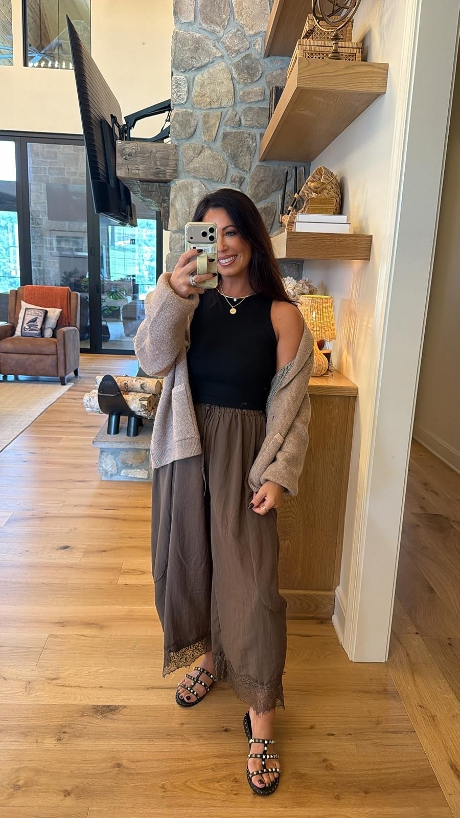The prettiest neutral fall outfit! These lace-trim wide-leg pants paired with a basic black tank and cozy cardigan create the perfect layered look.
#NeutralOutfit #WideLegPants #CardiganStyle #FallOutfit #LTKStyleTip #LTKFinds
