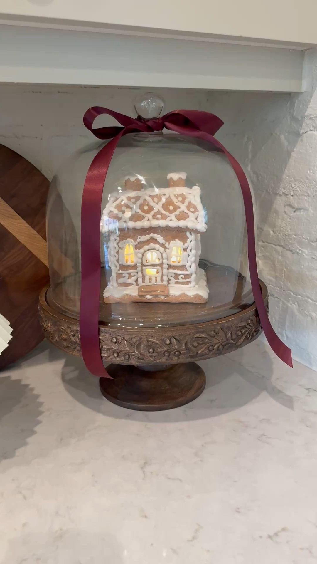 Gorgeous detailed wood cake stand with tall glass dome 

#LTKHome #LTKSeasonal #LTKHoliday