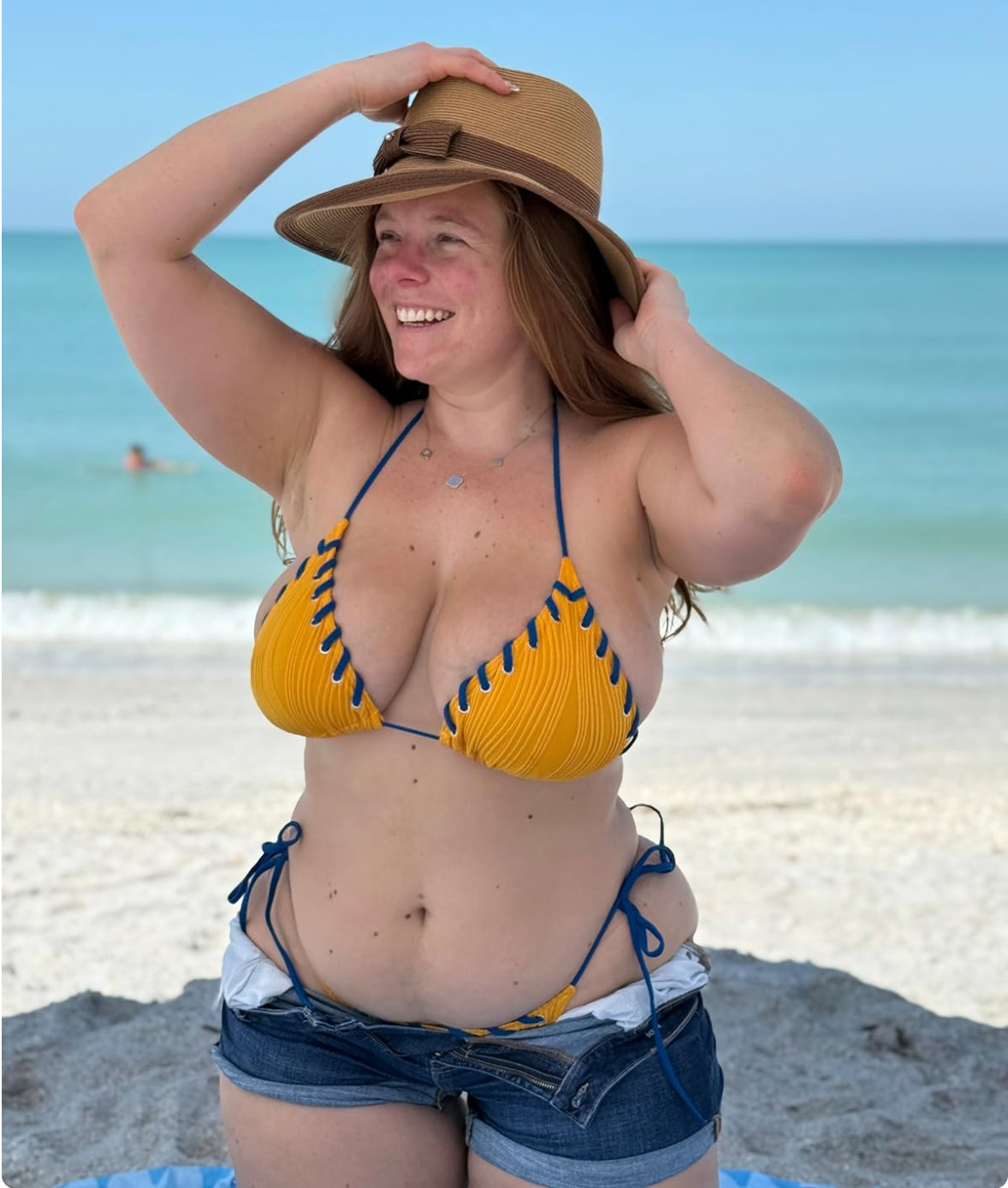 Yellow baseball strap design bikini 

 #LTKMidsize #LTKPlusSize #LTKSwim