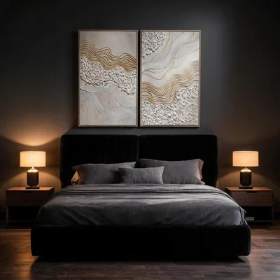 pair of extra large abstract canvases with gold waves over a bed