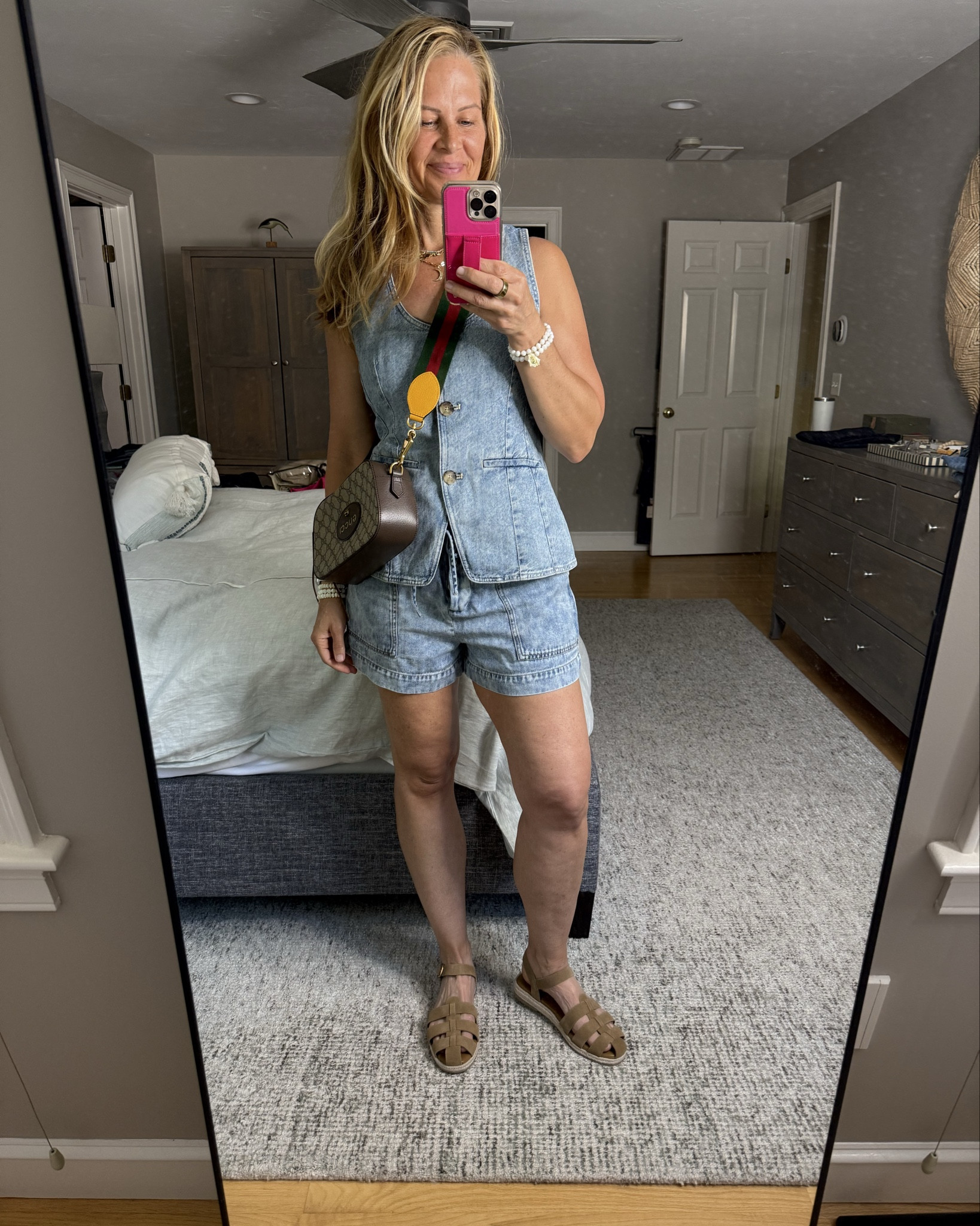 Denim on denim is a trend I LOVE!  Pairing Madewell Vest with Rails shorts that are soooo comfy and cute!  All items are true to size and paired it with vintage Gucci crossbody bag 💼 

#LTKOver40 #LTKSeasonal #LTKStyleTip