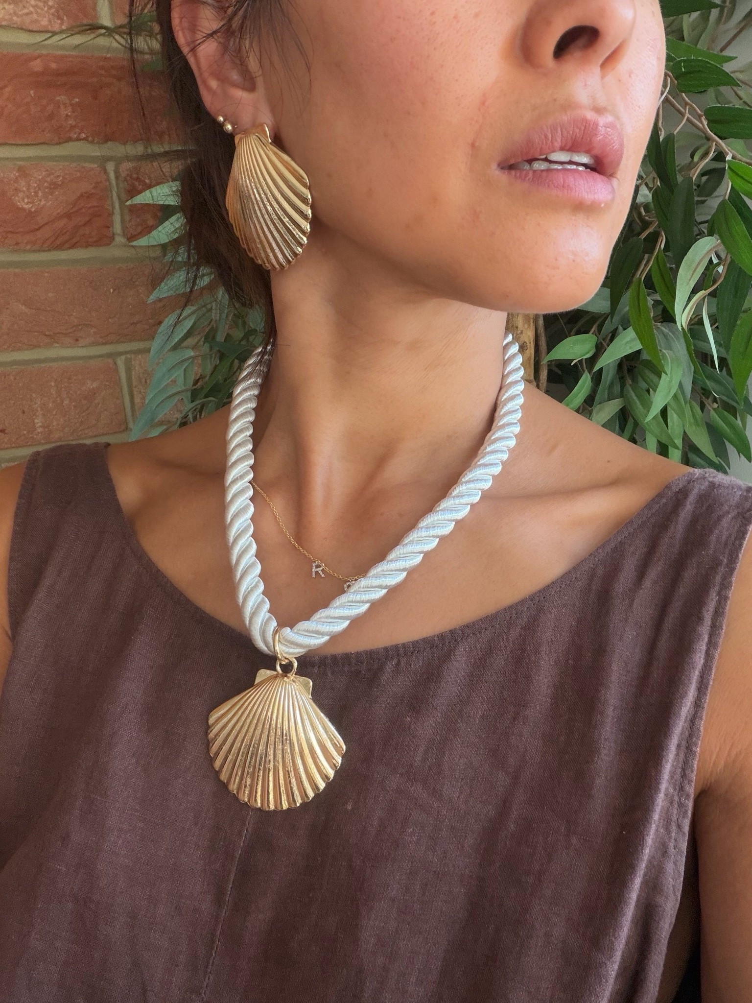 How stunning is this shell
Statement necklace and earrings set! Striking!

#LTKuk #LTKfestival #LTKsummer