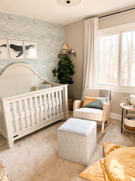 Expecting a baby boy? This nursery has been thoughtfully designed with a Jonah and the whale theme in mind for my little Jonah. The waves embellished the wallpaper to the beautiful 3-piece whale artwork, every detail has been purposefully curated to create a captivating underwater haven for my little boy 🩵 shop all that you see here for your boy’s nursery today! 

#LTKbaby #LTKhome #LTKkids
