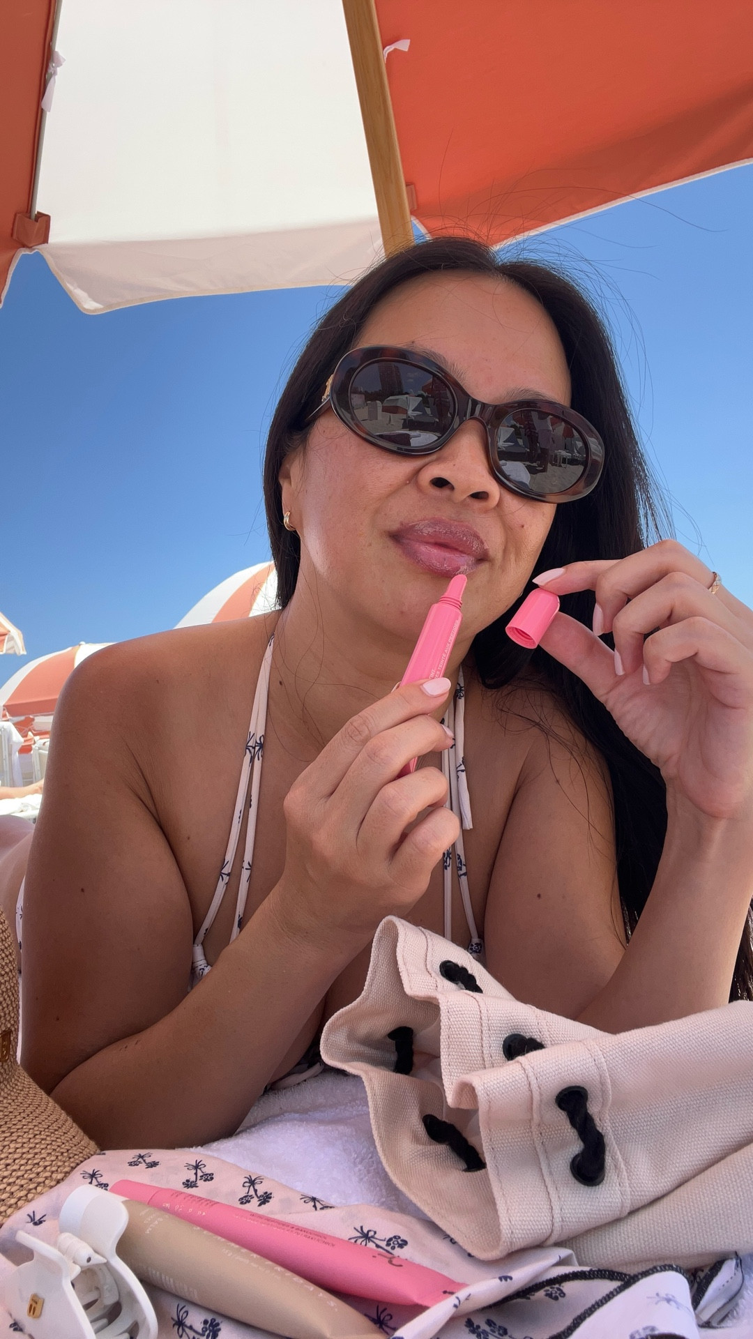 What's in beach bag, beauty edition. Living for the sunny days in South Beach! Can't believe we get to call this place our home. Who else packs more than one sunscreen and lip balm with them at all times?

@celine scrunchie
@welovecoco UV Essentiel Sunscreen SPF 50
@shiseido Ultimate Sun Protector Mineral SPF 60
@beautyofjoseon_official Day Dew Sunscreen SPF 50
@chanel.beauty mirror 
@maisonfranciskurkdjian Kurky (travel size)
@patricktabeauty Major Moisture Lip Balm Pink Salted Caramel
@summerfridays Lip Butter Balm
@rhode Peptide Lip Tint in Sweet Pea 

Sunnies @celine and swimsuit @montce_swim 

Can you believe we've officially lived in Miami for a full year now? Time FLIES!


#LTKBeauty #LTKSwim