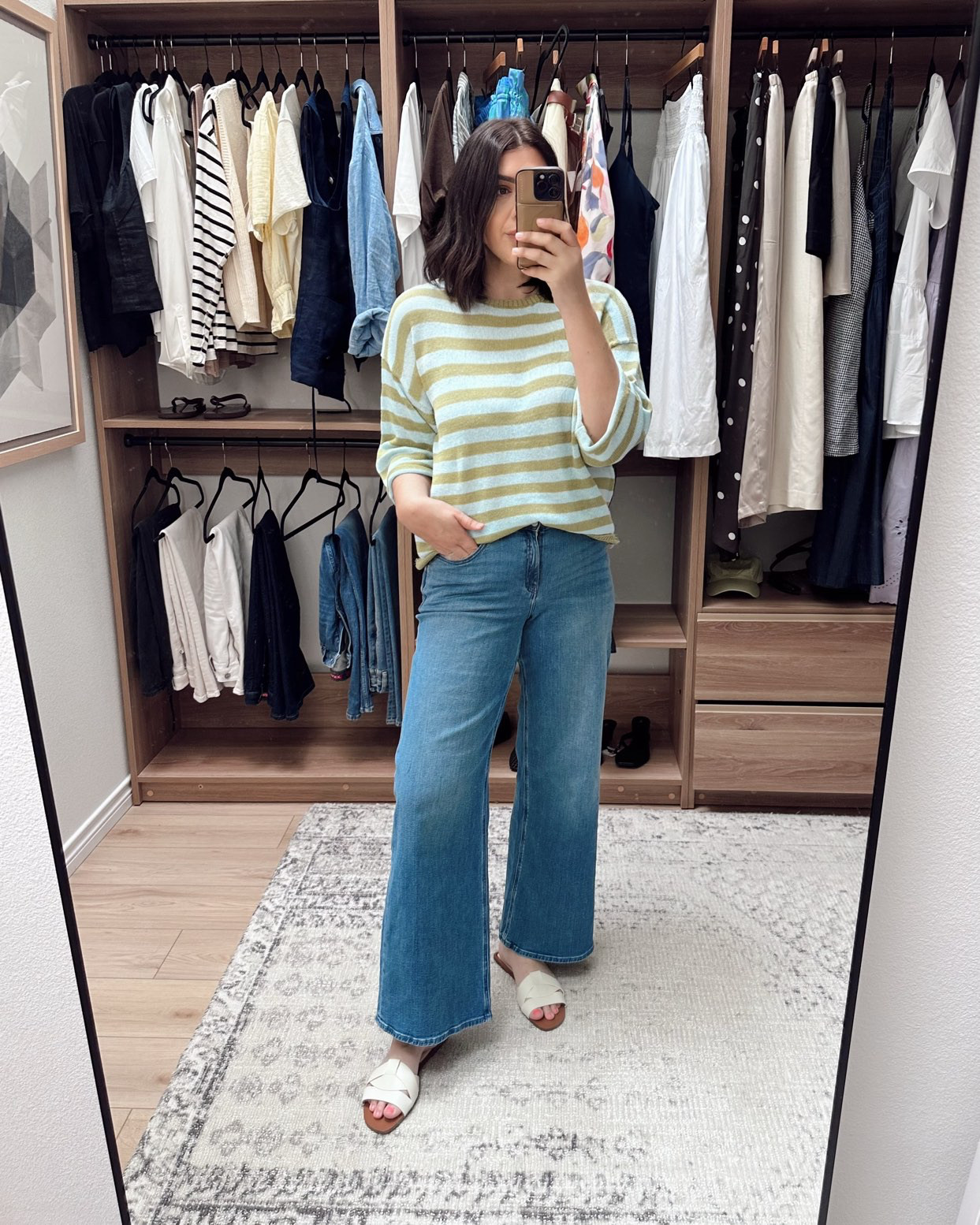 I loved this little sweater! top1 It’s lightweight and just almost sheer, but opaque enough I didn’t feel like I needed something underneath. This top comes in a pink and orange too, I couldn’t decide which one so I went with the blue. 

I’m in the large and I like the oversized fit! 

I'm in the 30 of the jeans, tts fit.  

 