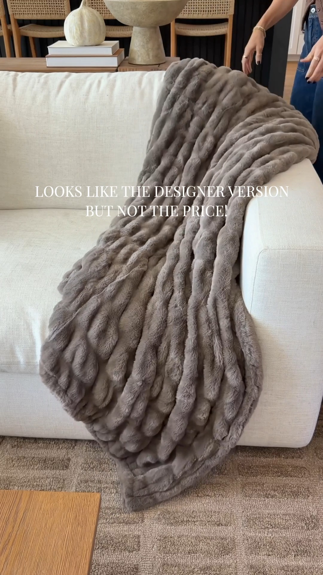 (This is the walnut color  in the size 50 x 60)￼
There are plenty of faux-fur blankets on the market that cost hundreds of dollars, but this one from Spring Tree gives you the same soft, luxurious look at a much more budget-friendly price. It’s also the brand behind our bath towels, so I already knew the quality would be good. @Springtree Home

#LTKdayinmylife #LTKSeasonal #LTKHome