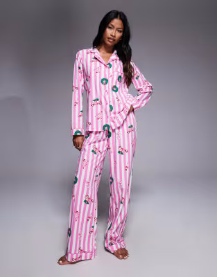 Boux Avenue fleece long sleeve & trouser PJ set in a bag in pink striped christmas print | ASOS (Global)
