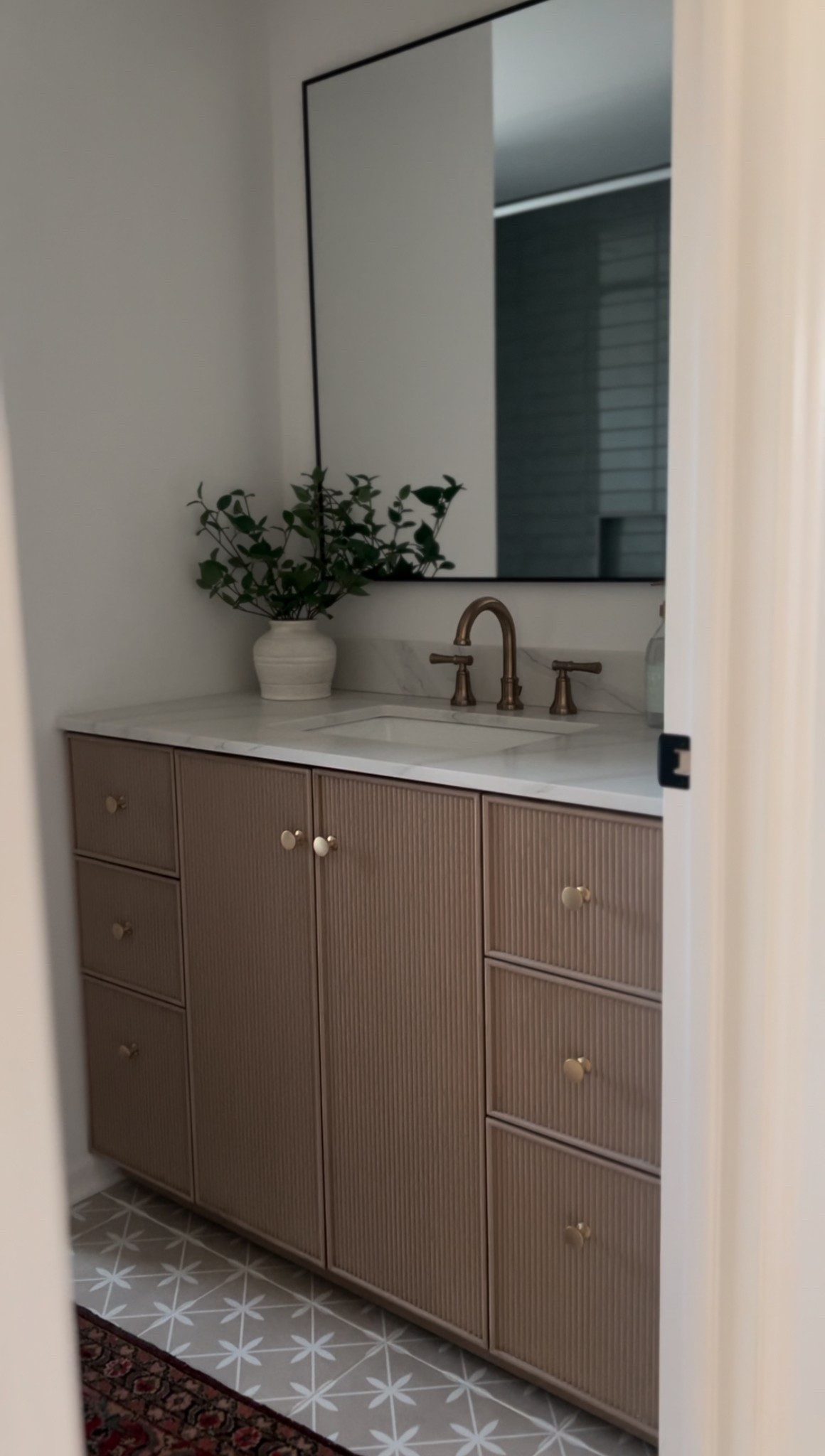 Greendale bathroom reno with this white oak fluted vanity! 

#LTKHome