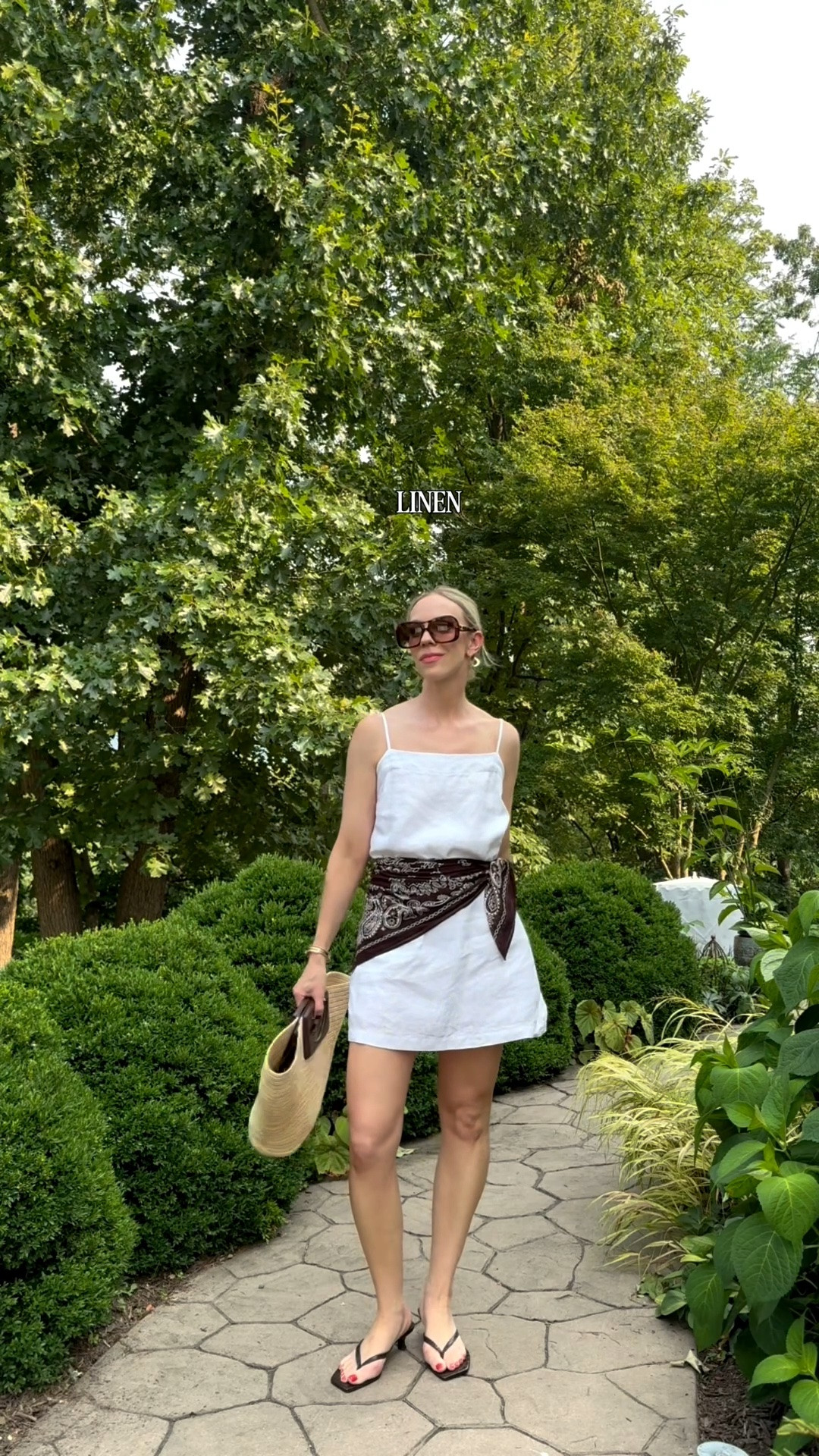 Linen skort dress, @Madewell brown bandana scarf (on major sale), Le Tanneur straw tote

#LTKSeasonal #LTKSaleAlert #LTKOver40