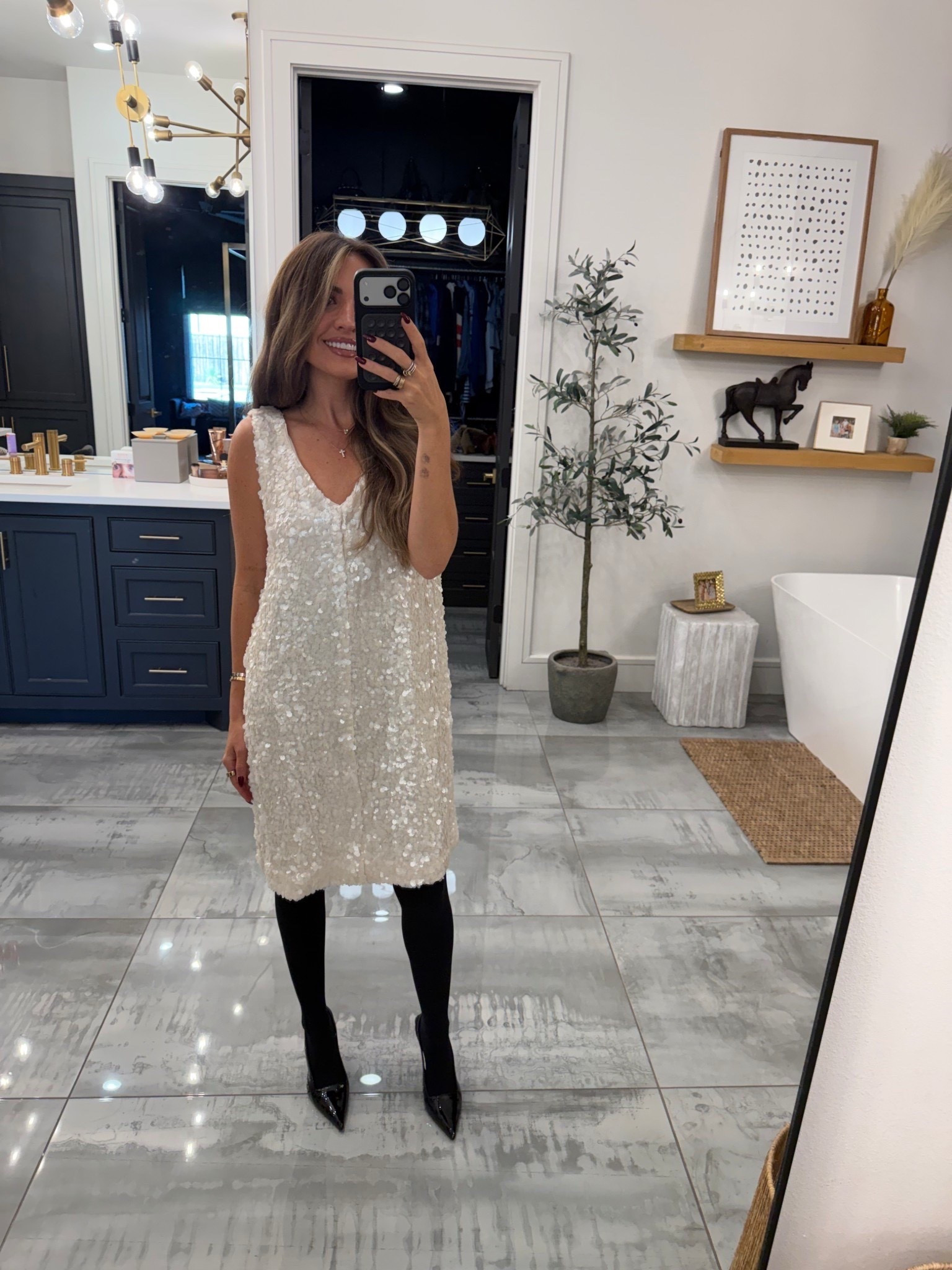 It’s holiday season and I just got this gorgeous Nordstrom Made dress in from @Nordstrom. Loved it styled with black panty hose and heels. You could wear it multiple ways and for multiple occasions. #NordstromPartner 